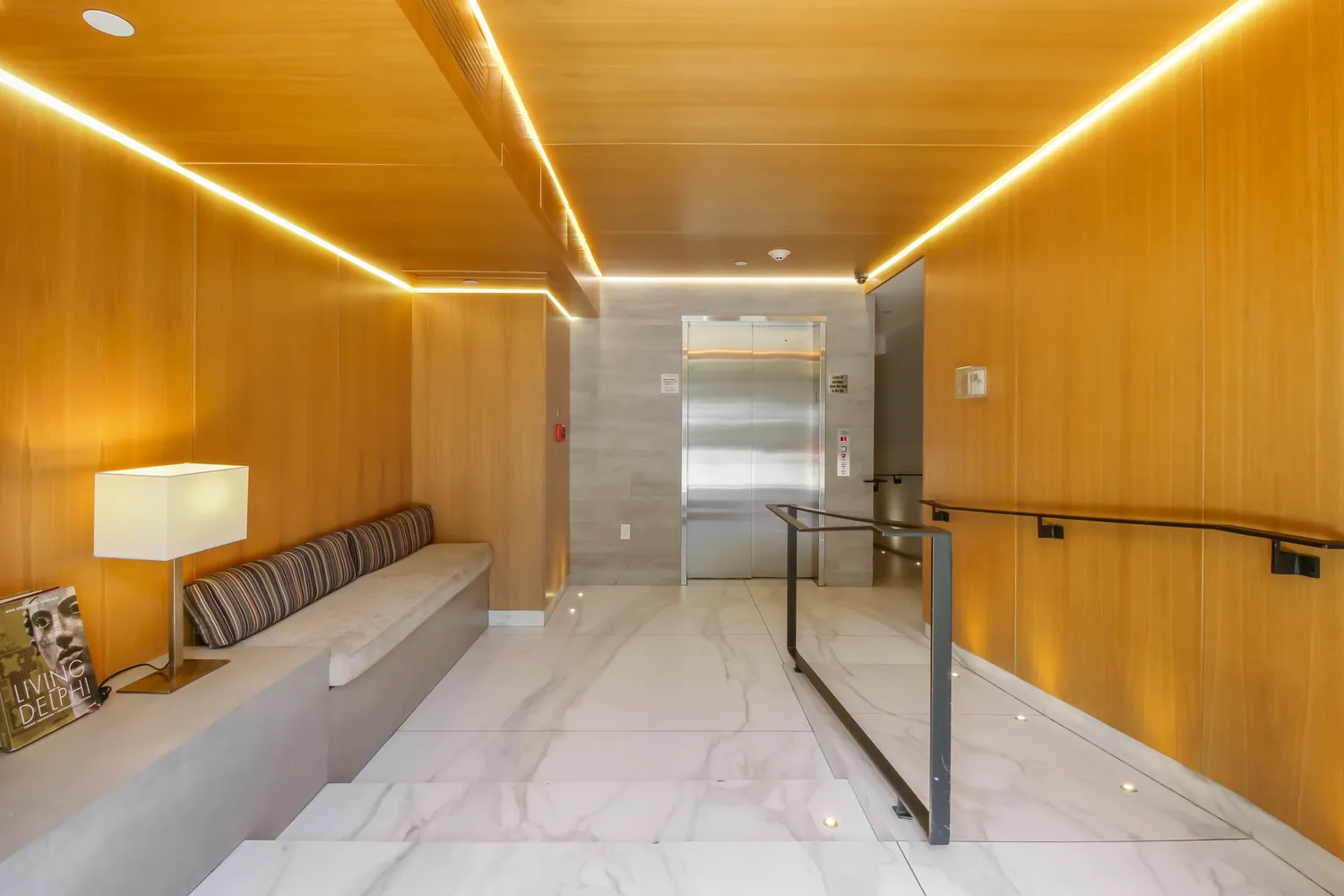 a view of a hallway with a furniture