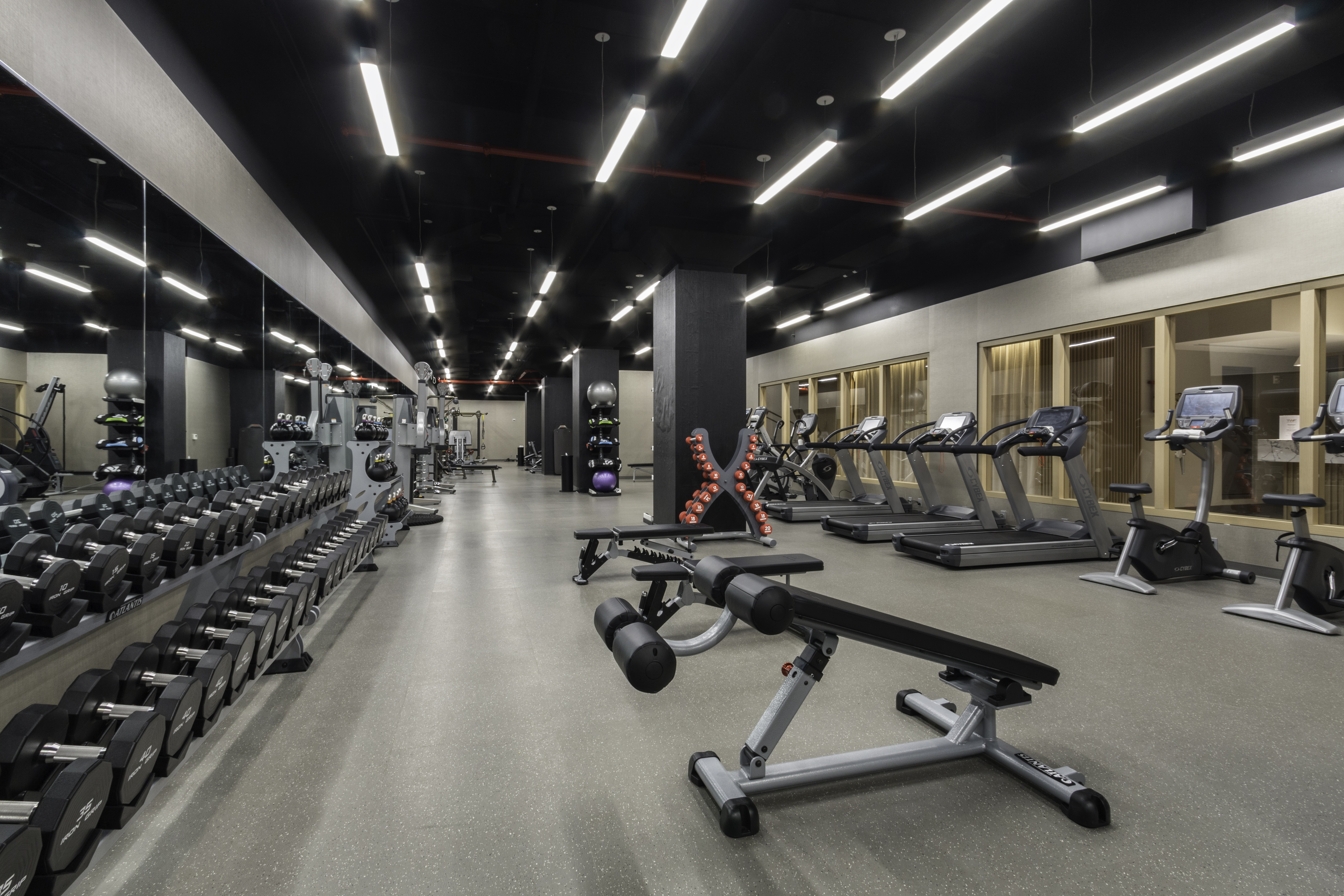 100 Barclay Street, Unit 13K Manhattan, NY 10007 - Photo 20 of 27 a view of a room with gym equipment