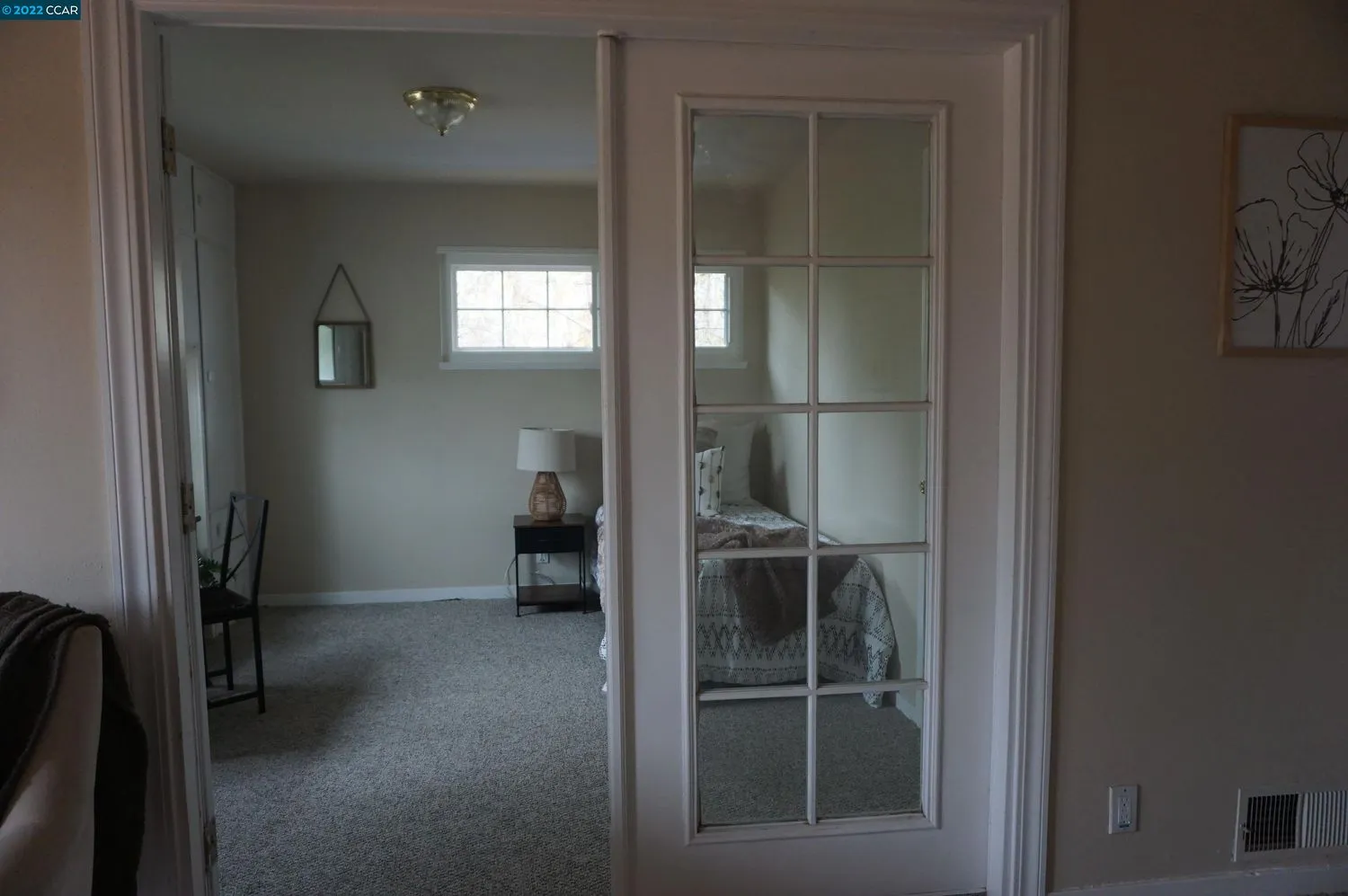 a view of workspace and bathroom