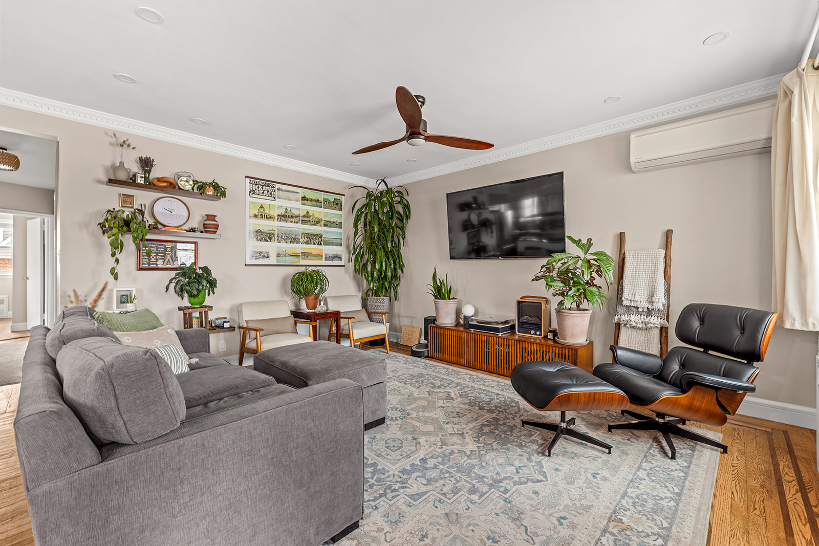 524 Beach 127th Street Queens, NY 11694 - Photo 3 of 18 a living room with furniture a flat screen tv and a large window
