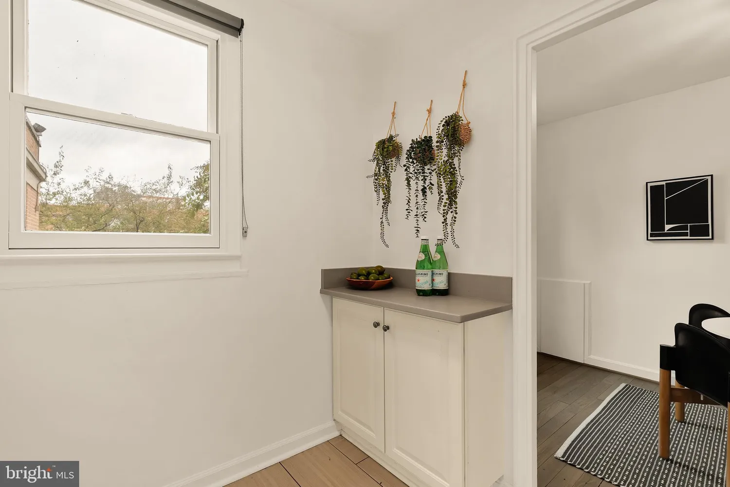 a view of front door and wooden floor
