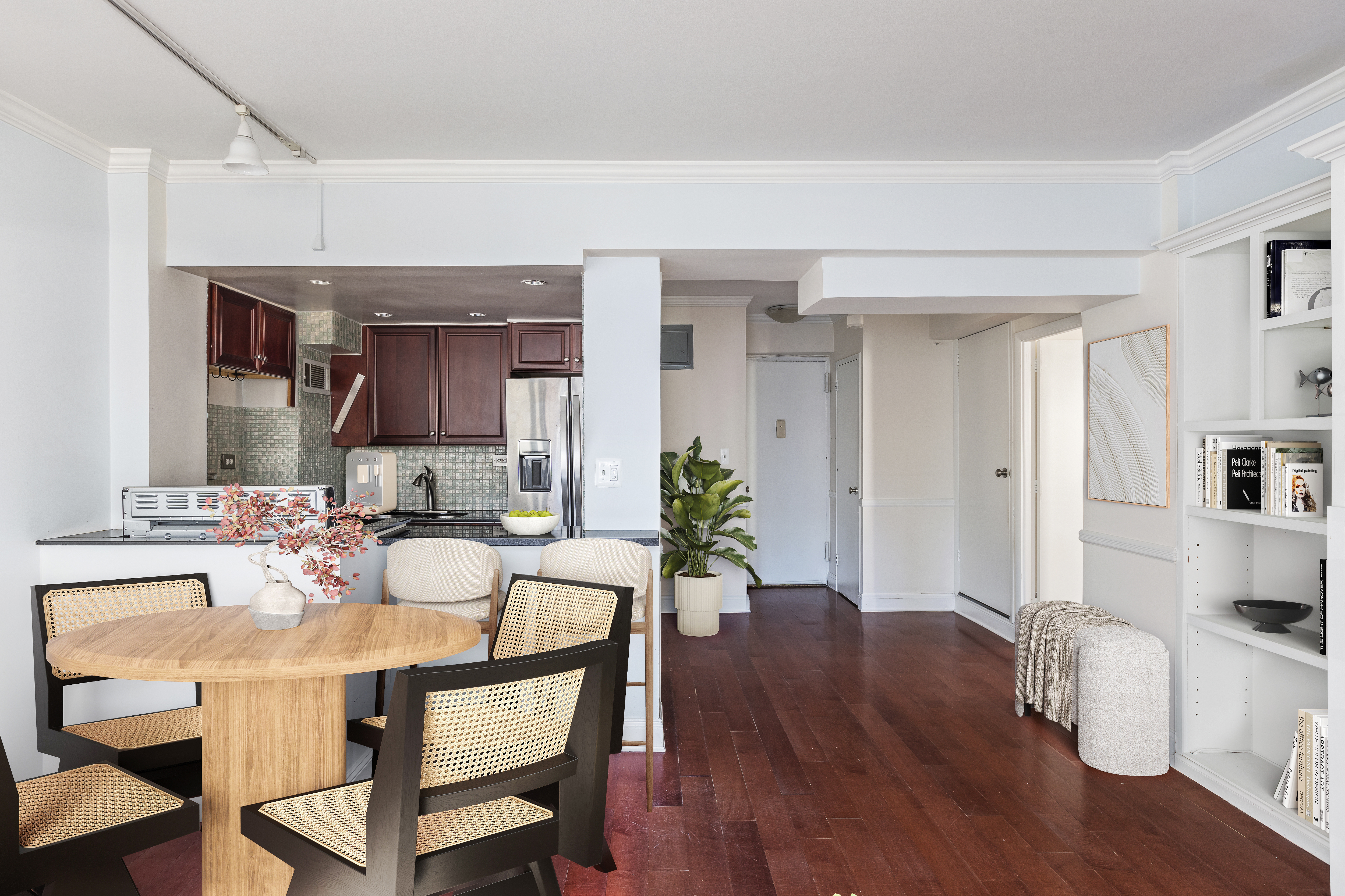 210 East 36th Street, Unit PHC Manhattan, NY 10016 - Photo 3 of 13 a view of a dining room with furniture and wooden floor