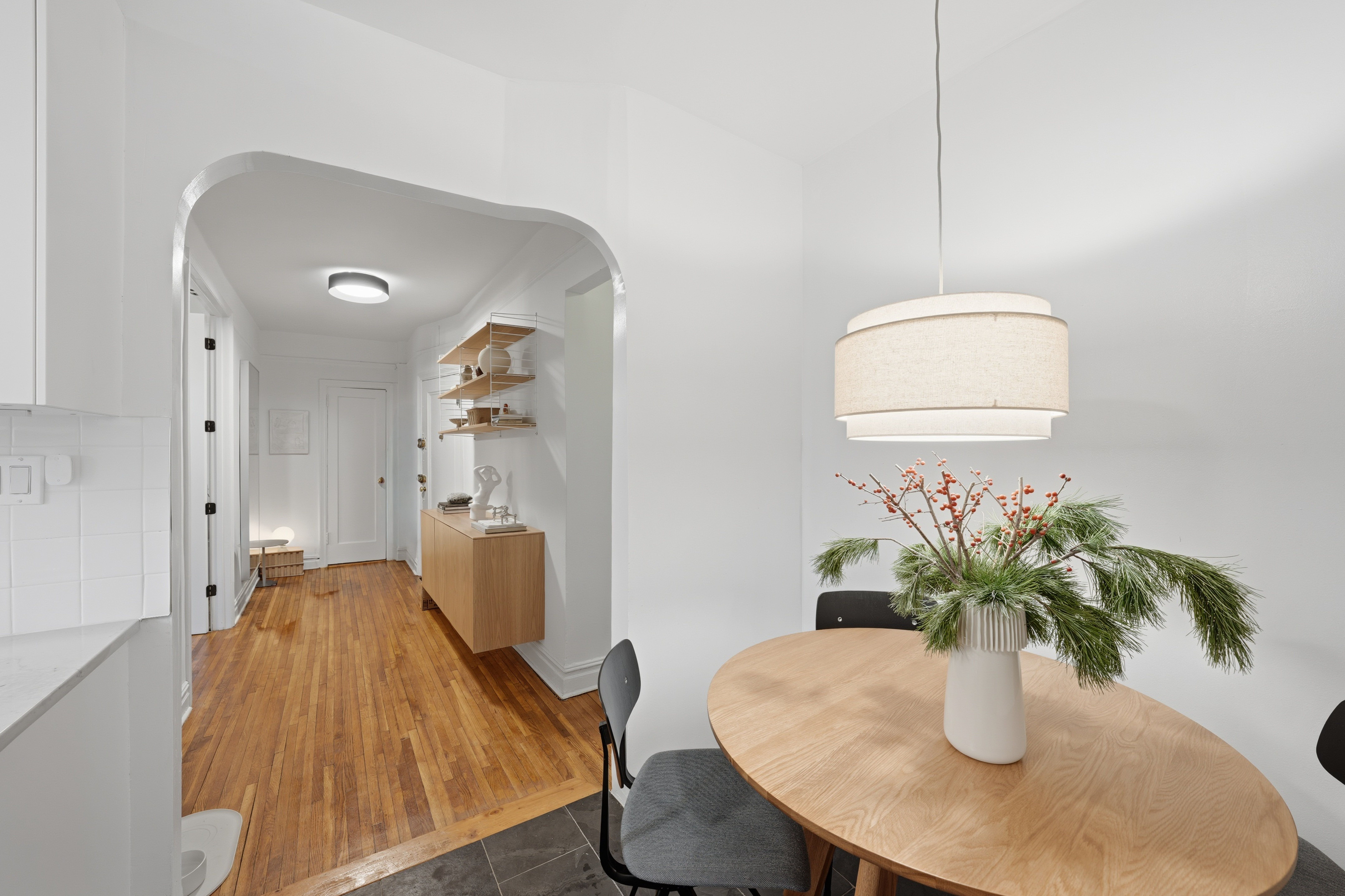 80 Avenue P, Unit D14 Brooklyn, NY 11204 - Photo 10 of 19 a dining room with furniture and potted plant
