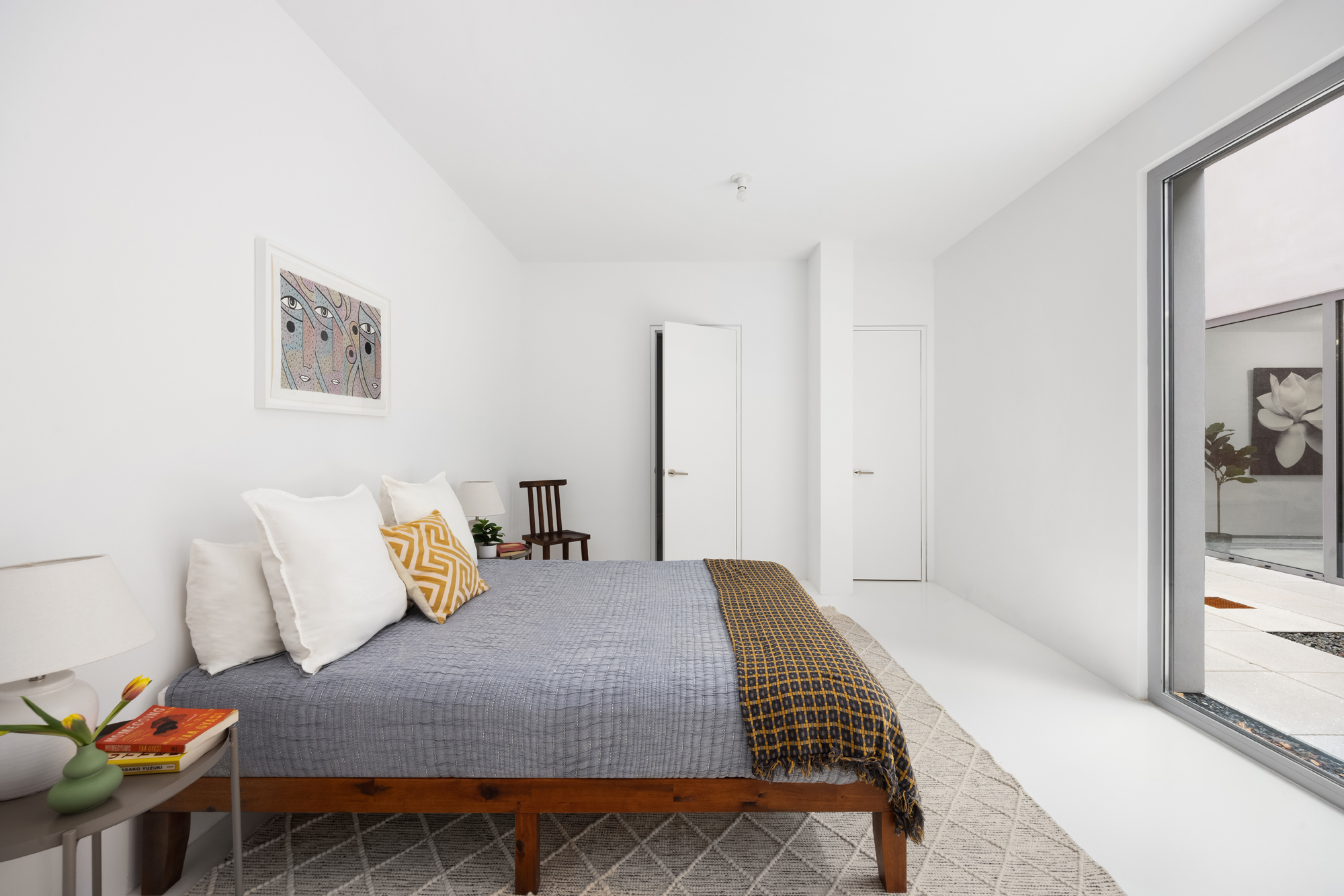 272 Greene Avenue Brooklyn, NY 11238 - Photo 5 of 22 a bedroom with a bed and ceiling fan