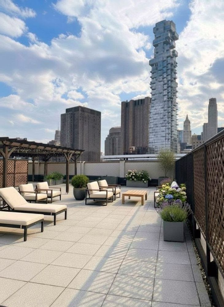 260 West Broadway, Unit 4C Manhattan, NY 10013 - Photo 26 of 28 a terrace with outdoor seating and city view