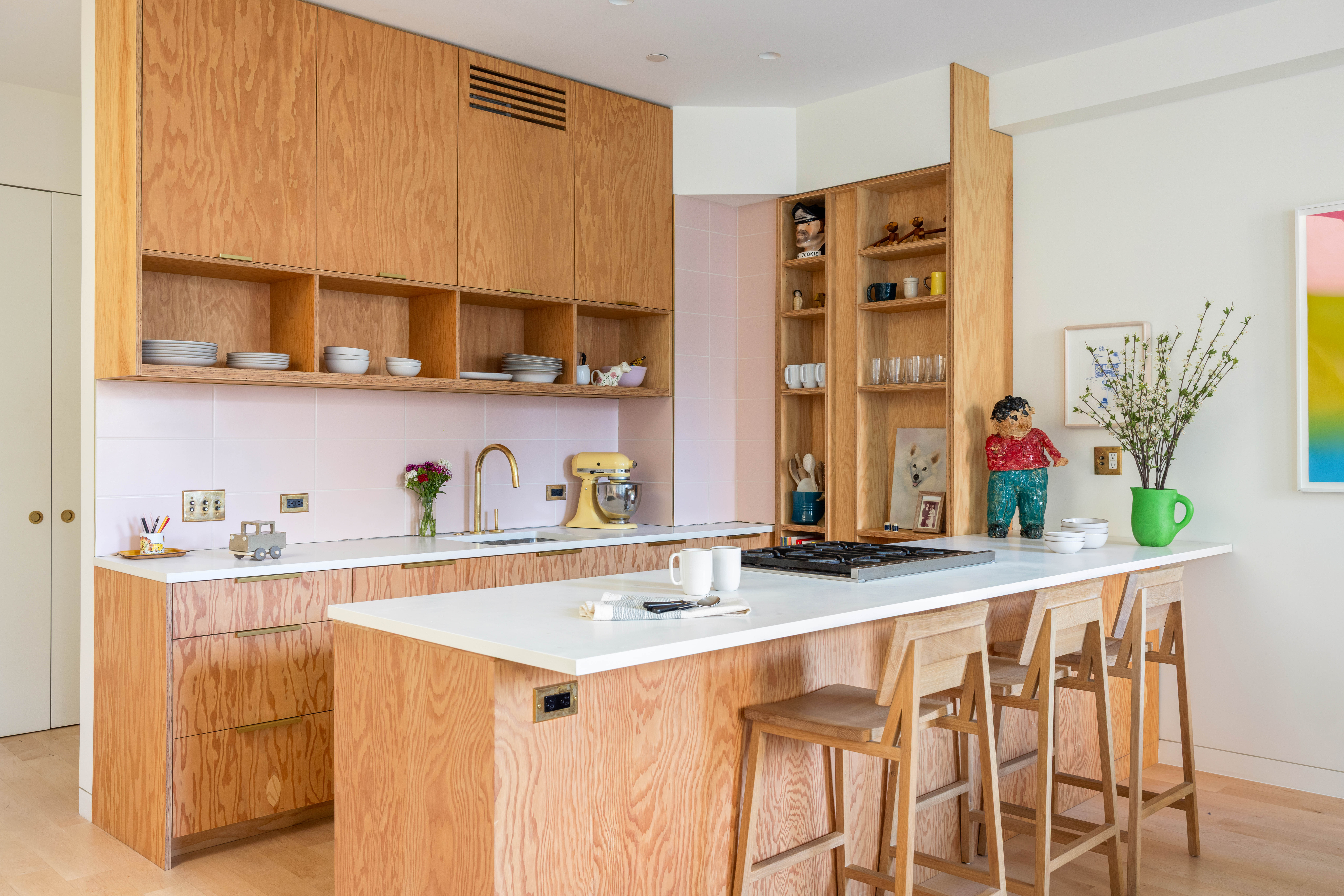 130 Jane Street, Unit 5/6F Manhattan, NY 10014 - Photo 5 of 23 a kitchen with stainless steel appliances granite countertop a sink and a refrigerator