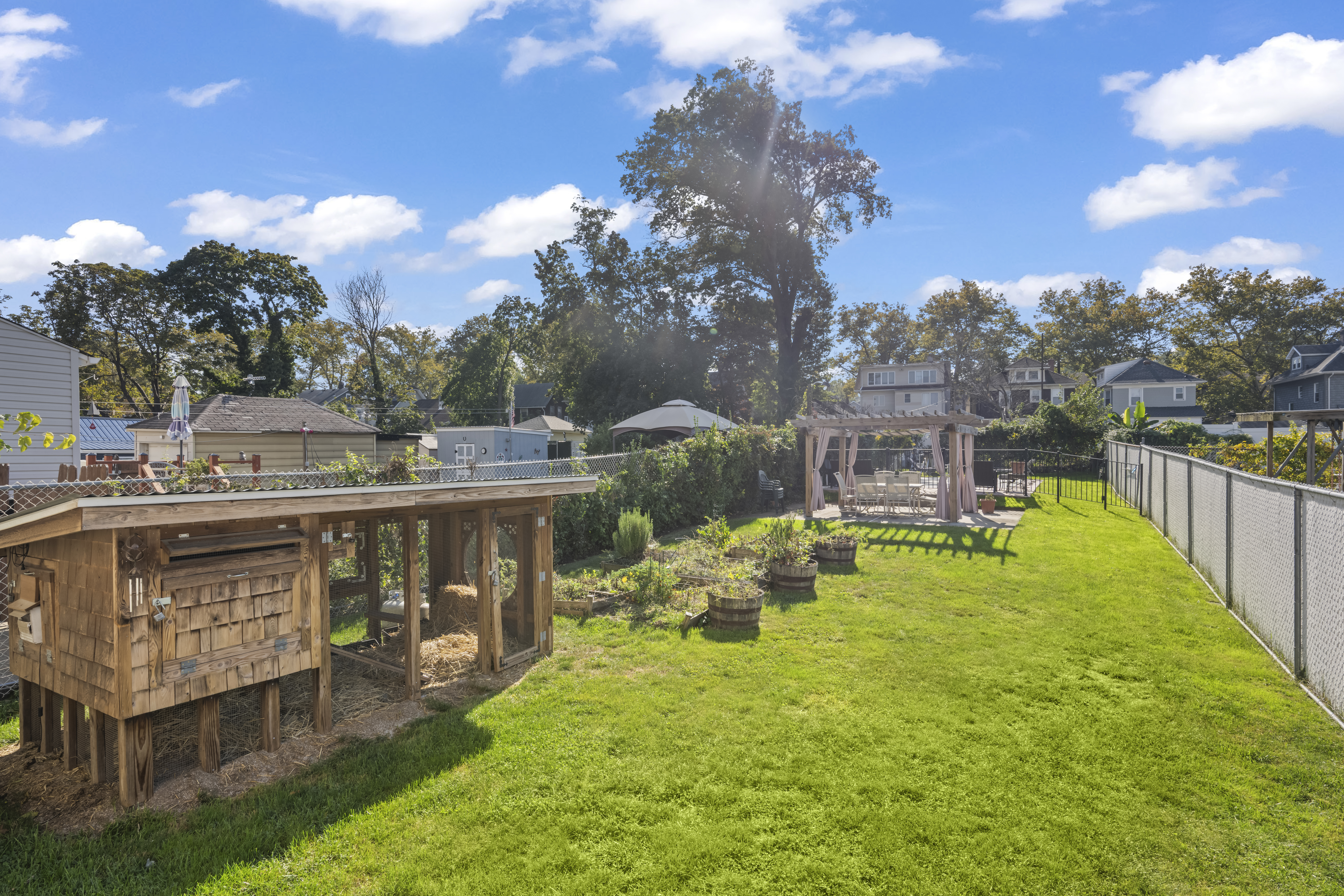 704 Delafield Avenue Staten Island, NY 10310 - Photo 23 of 35 a view of a lake with a house in the background