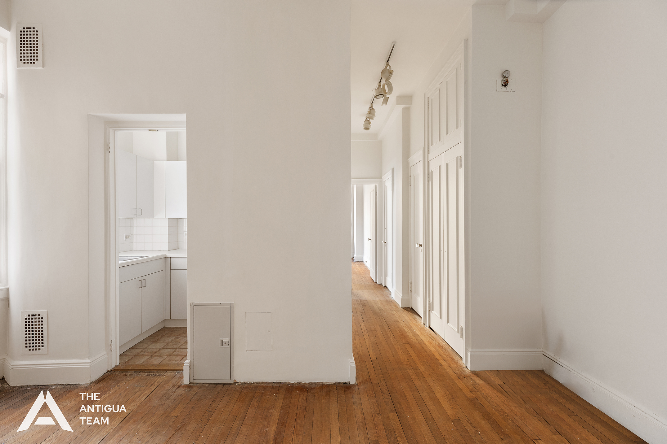 45 East 66th Street, Unit 4N Manhattan, NY 10065 - Photo 2 of 10 a view of a hallway with wooden floor