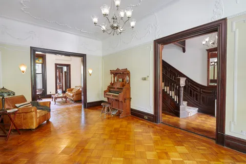 a view of a livingroom with furniture and a livingroom