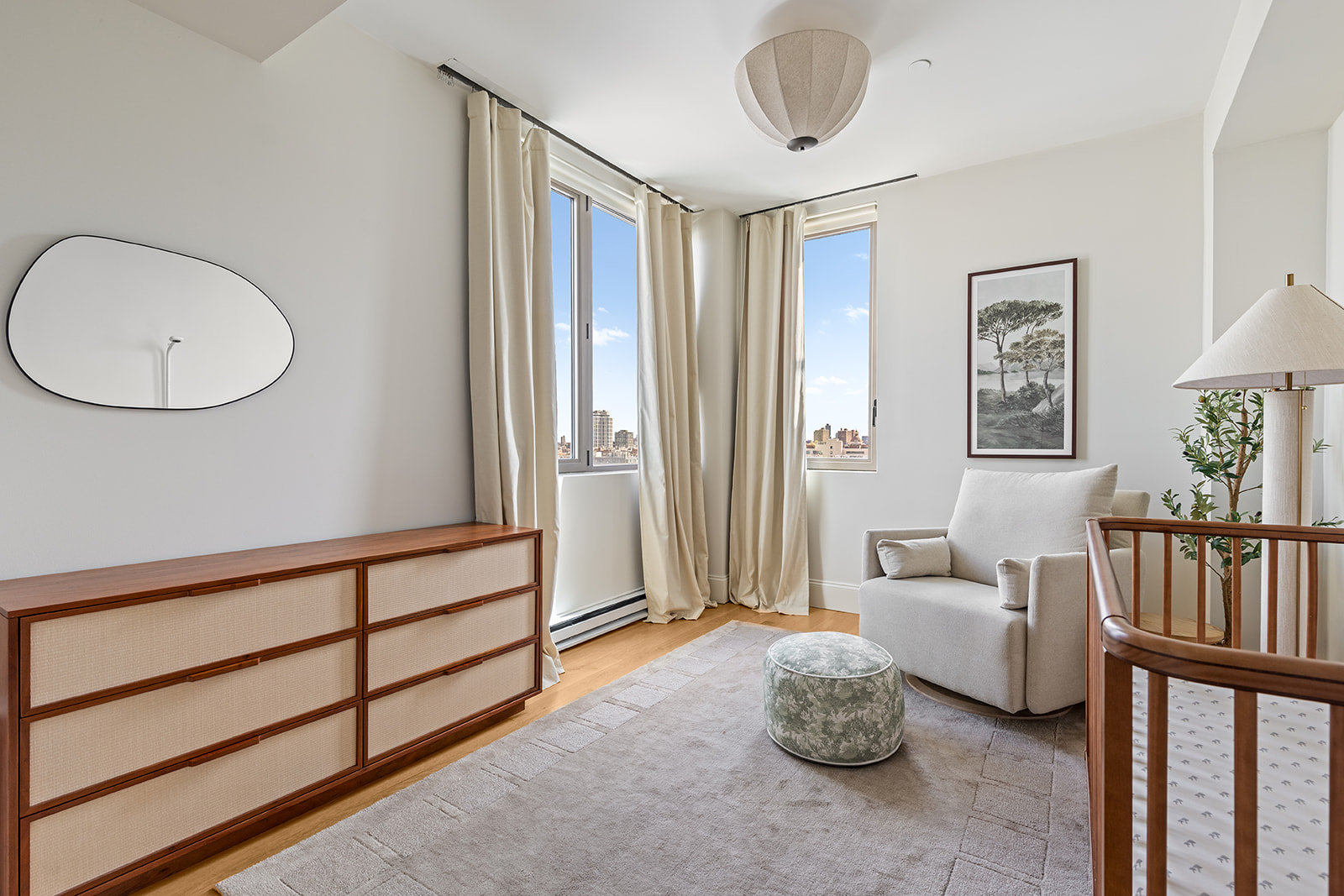 144 North 8th Street, Unit 8C Brooklyn, NY 11249 - Photo 6 of 13 a living room with furniture and a window