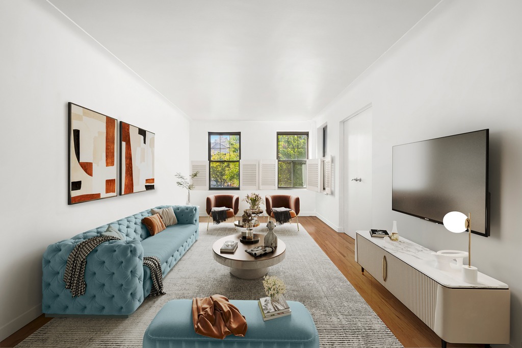 290 6th Avenue, Unit 2KL Manhattan, NY 10014 - Photo 1 of 18 a living room with furniture and a flat screen tv