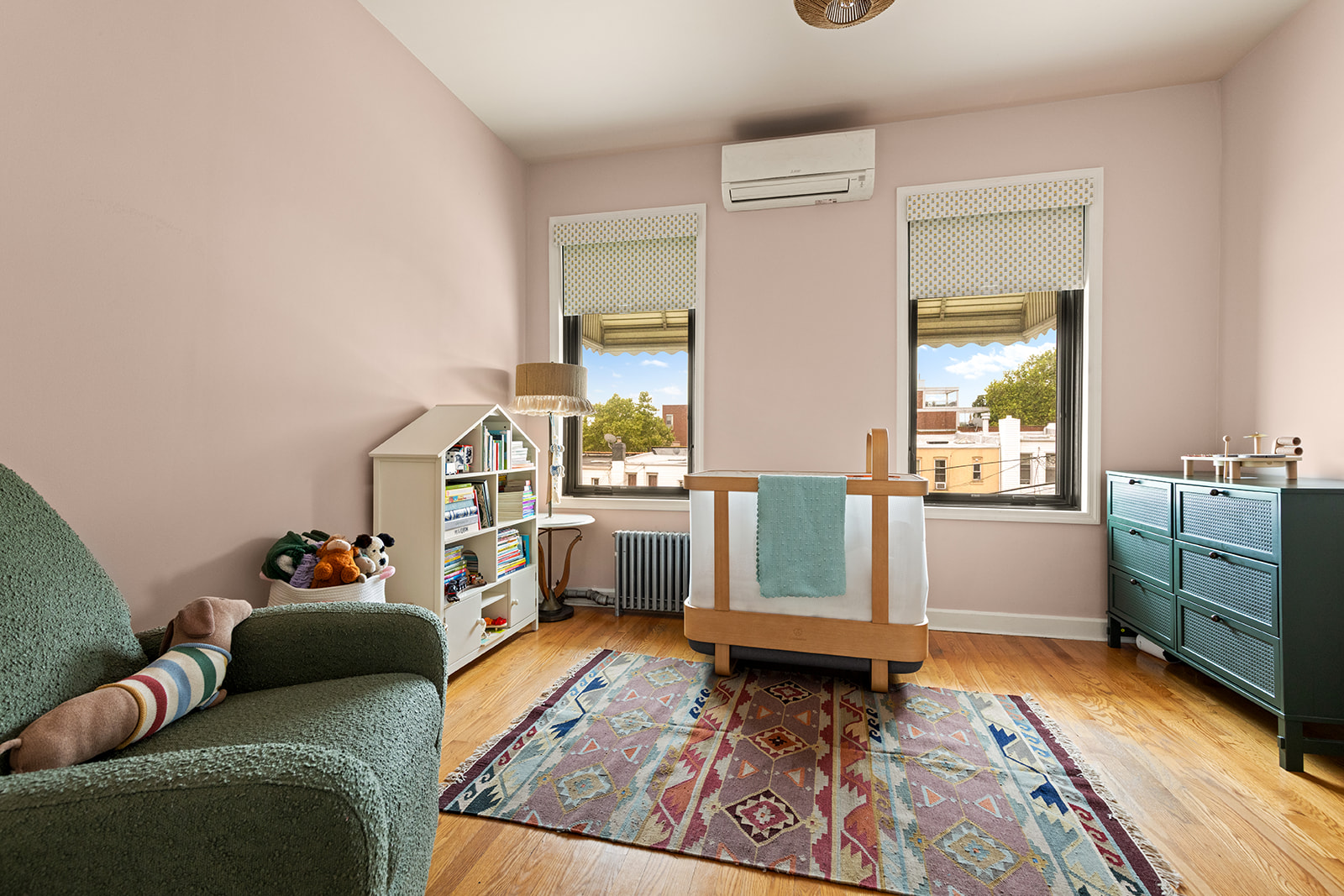 570 19th Street Brooklyn, NY 11218 - Photo 7 of 13 a living room with furniture and a wooden floor