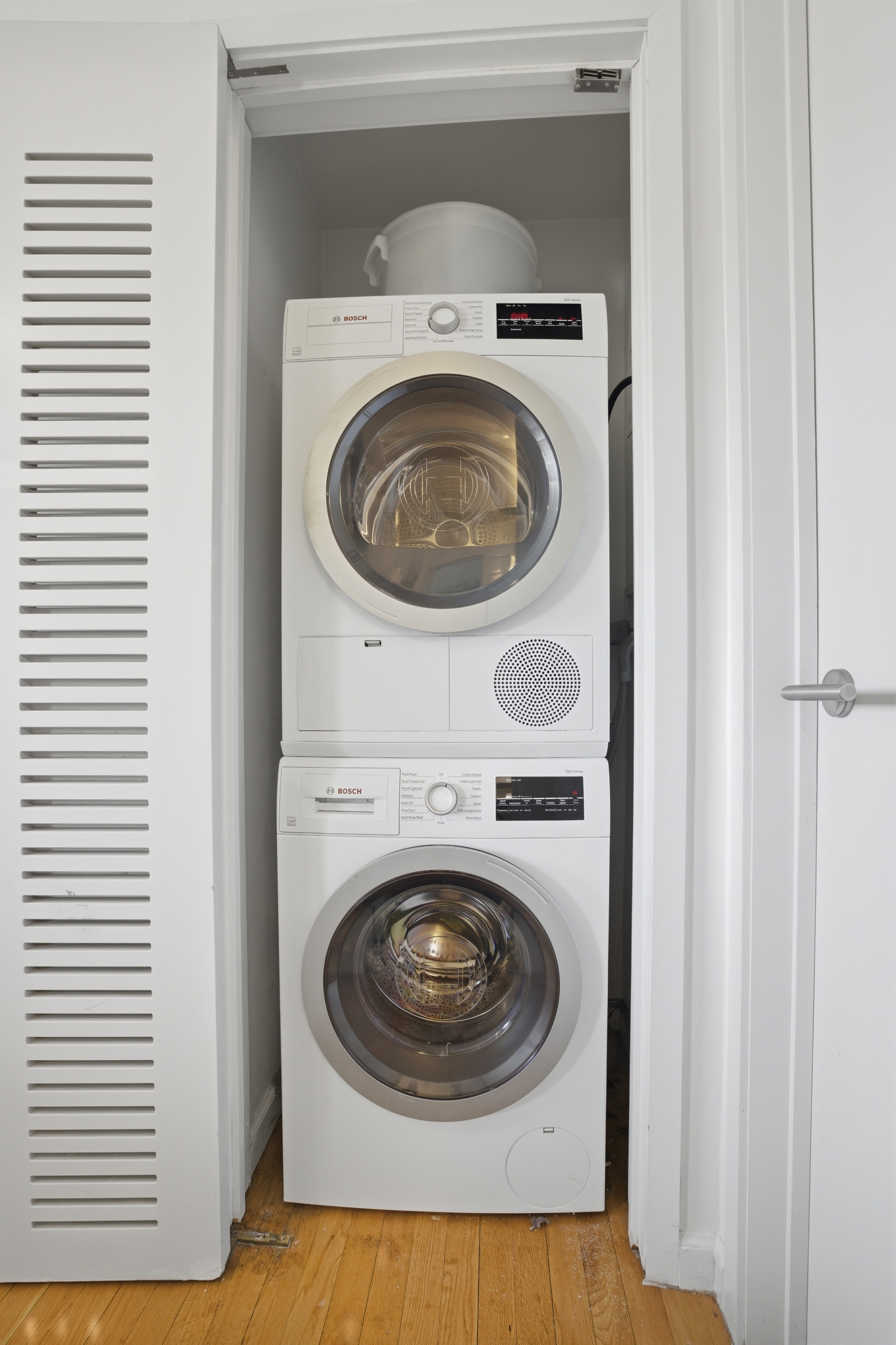 305 2nd Avenue, Unit 521 Manhattan, NY 10003 - Photo 15 of 20 a utility room with dryer and washer