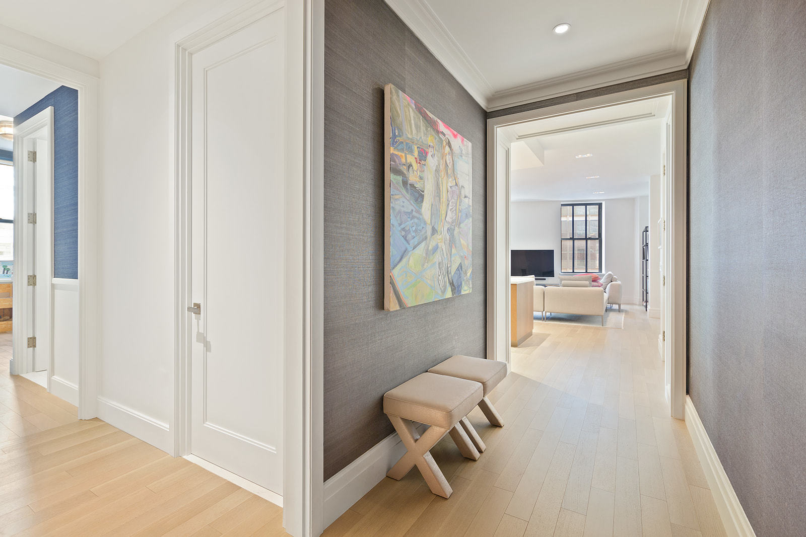 100 Barclay Street, Unit 13K Manhattan, NY 10007 - Photo 5 of 11 a view of a livingroom with wooden floor and furniture