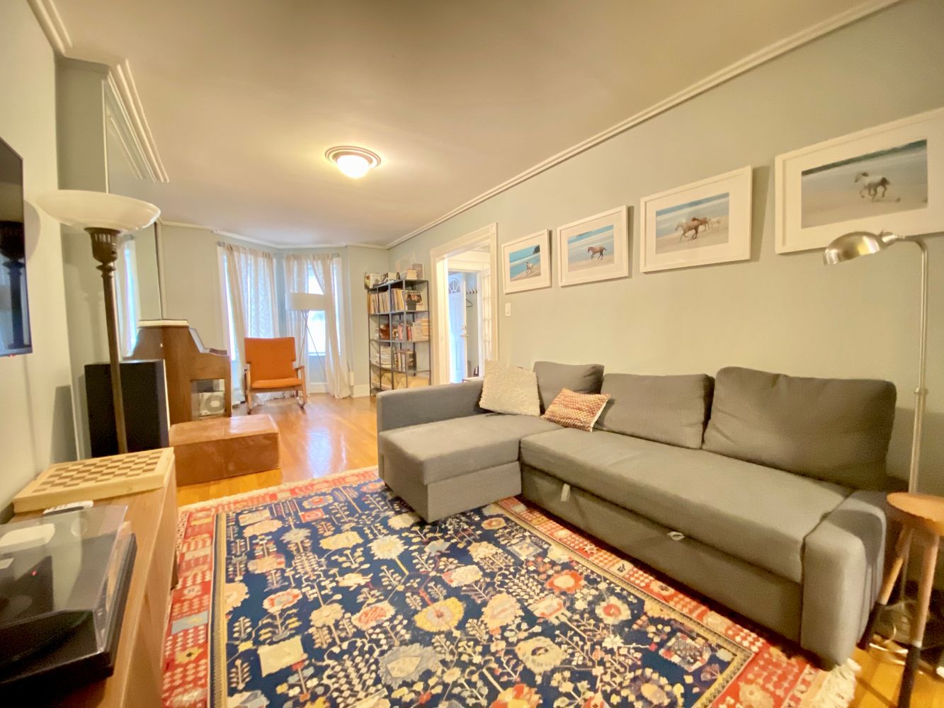 390 5th Street, Unit 1 Brooklyn, NY 11215 - Photo 8 of 15 a living room with furniture and wooden floor