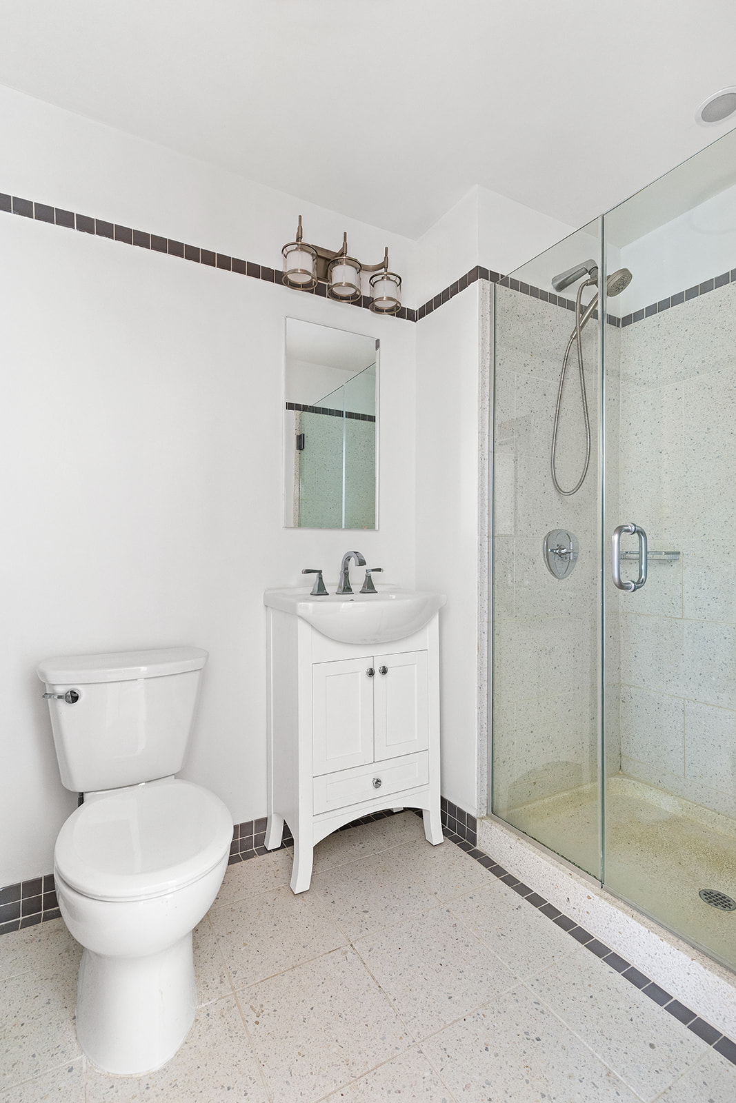 145 Park Place, Unit 6B Brooklyn, NY 11217 - Photo 10 of 17 a bathroom with a toilet sink and shower