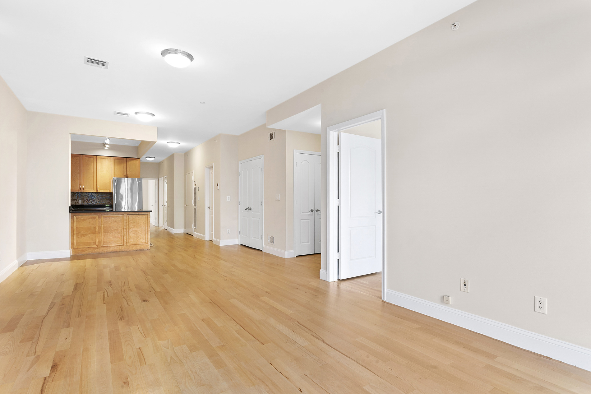 330 Bergen Street, Unit 4D Brooklyn, NY 11217 - Photo 2 of 9 a view of empty room with wooden floor