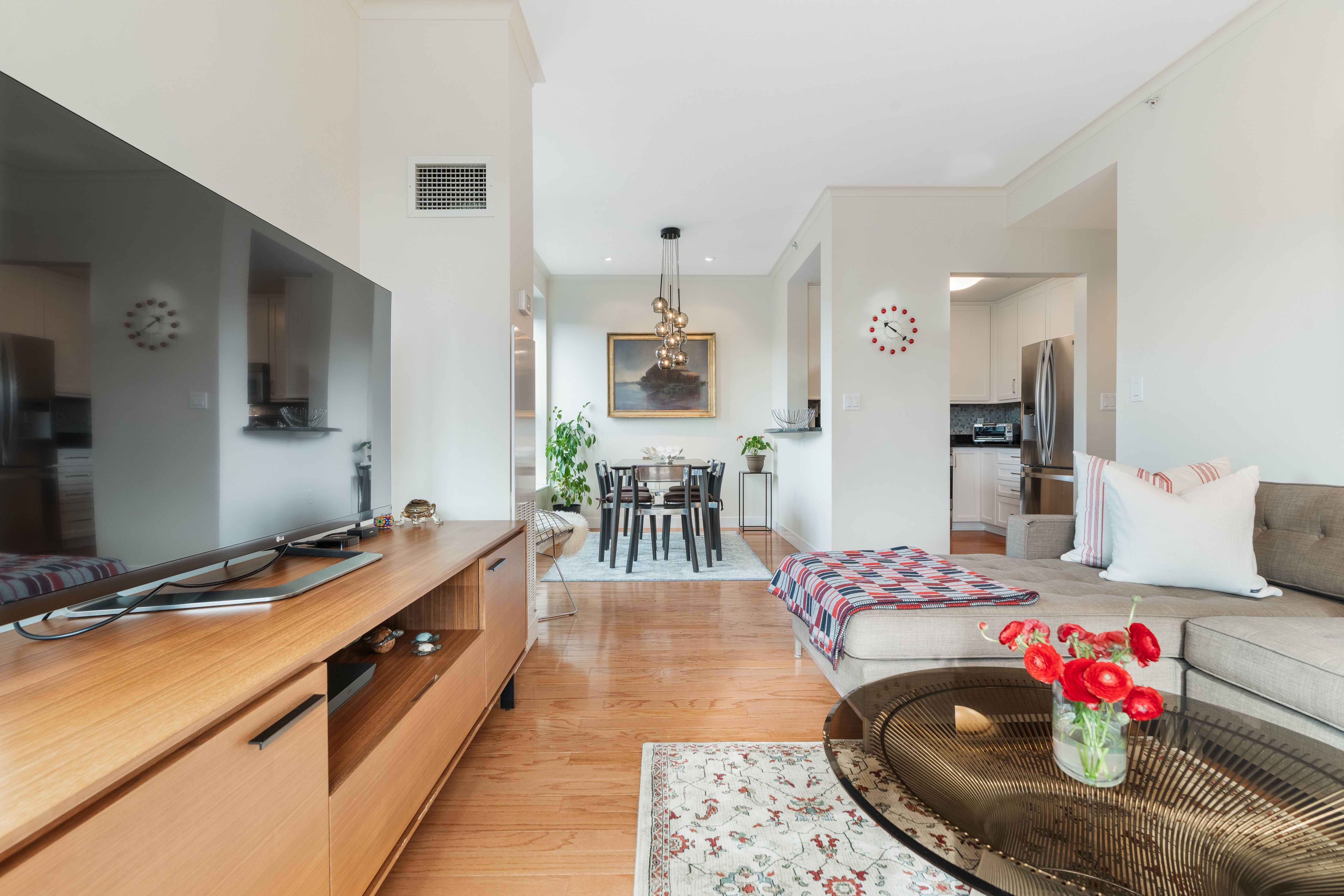 2 Rollins Street, Unit D601 Boston, MA 02118 - Photo 5 of 29 a living room with furniture and flat screen tv