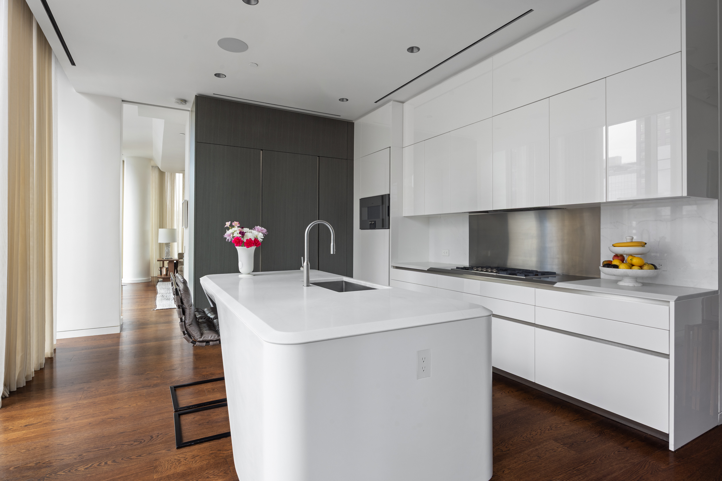 520 West 28th Street, Unit PH37 Manhattan, NY 10001 - Photo 13 of 45 a kitchen that has a sink and a stove in it