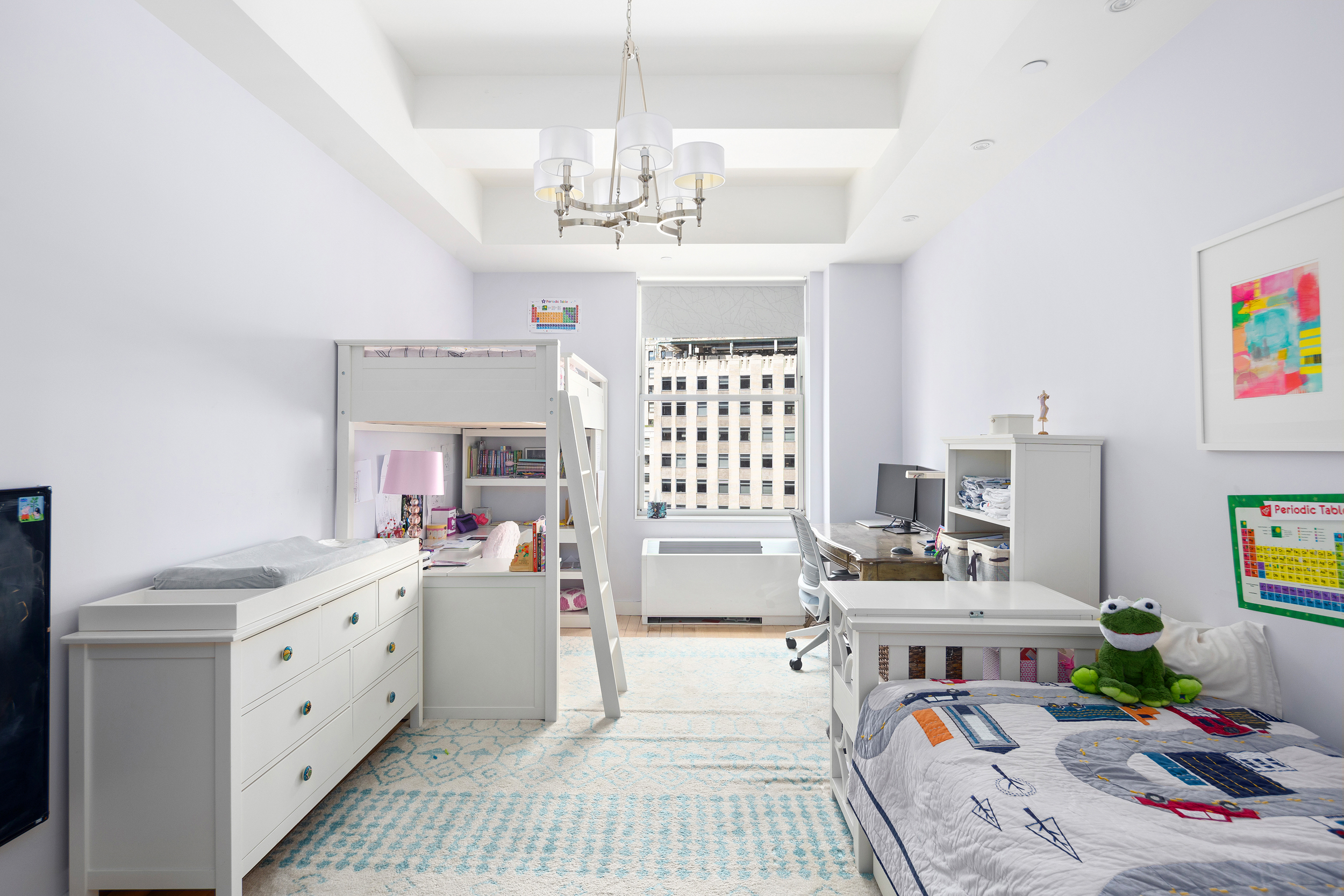 15 Broad Street, Unit 2404 Manhattan, NY 10005 - Photo 7 of 23 a very nice looking dining room with a lot of white furniture a chandelier and a window