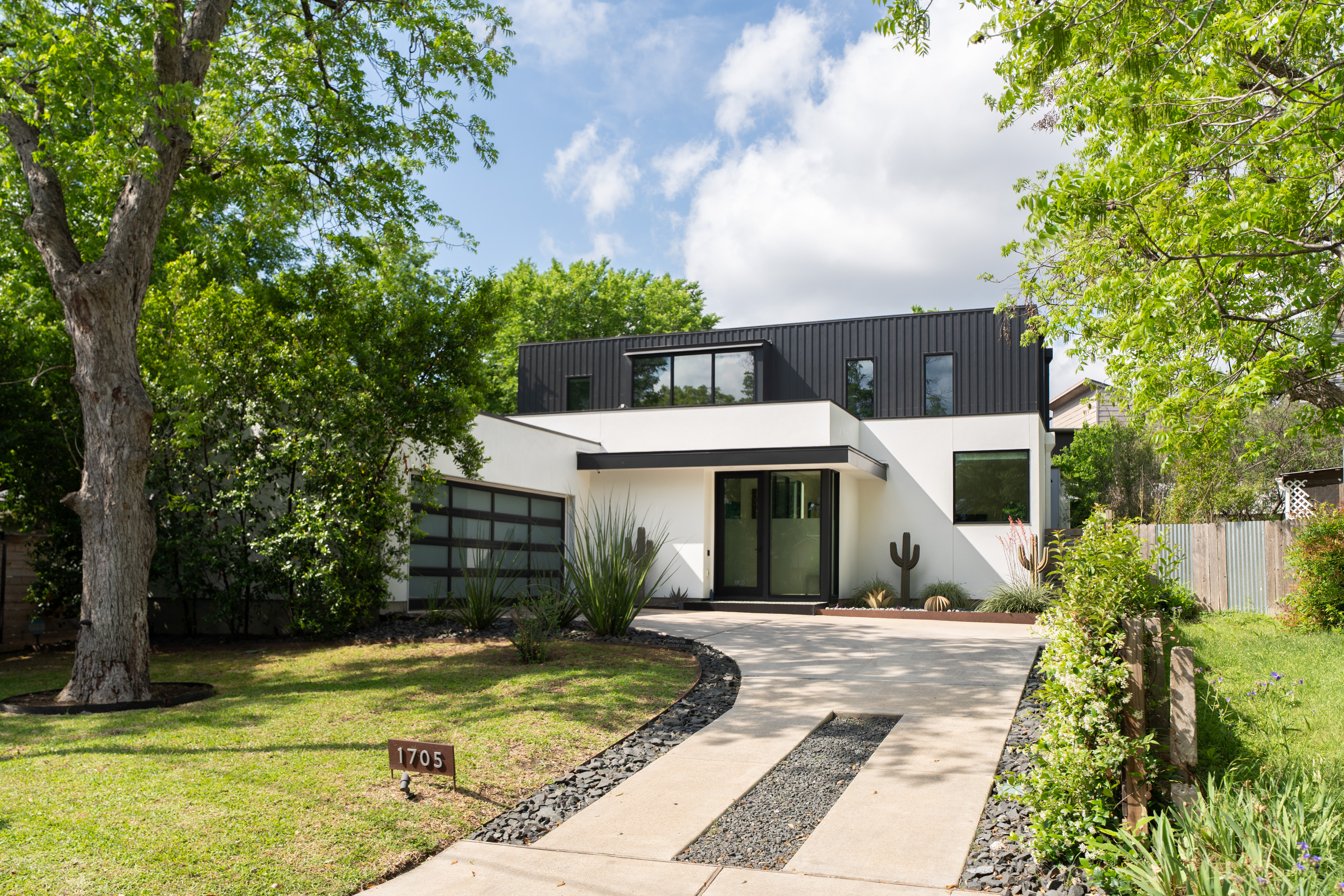 Address Upon Request Austin, TX 78704 - Photo 1 of 27 a front view of a house with a yard