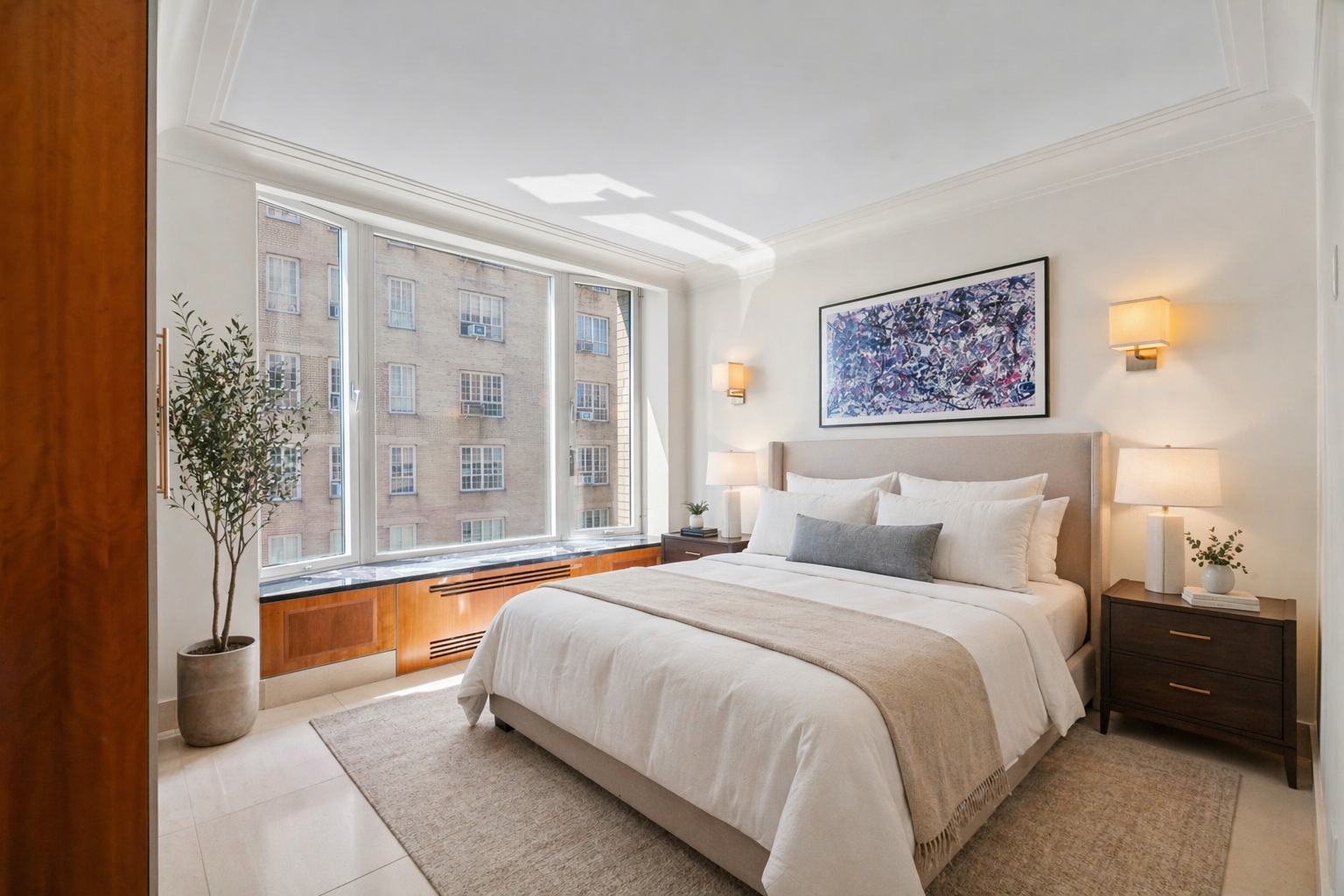 279 Central Park West, Unit 11B Manhattan, NY 10024 - Photo 13 of 24 a spacious bedroom with a bed and a painting on the wall