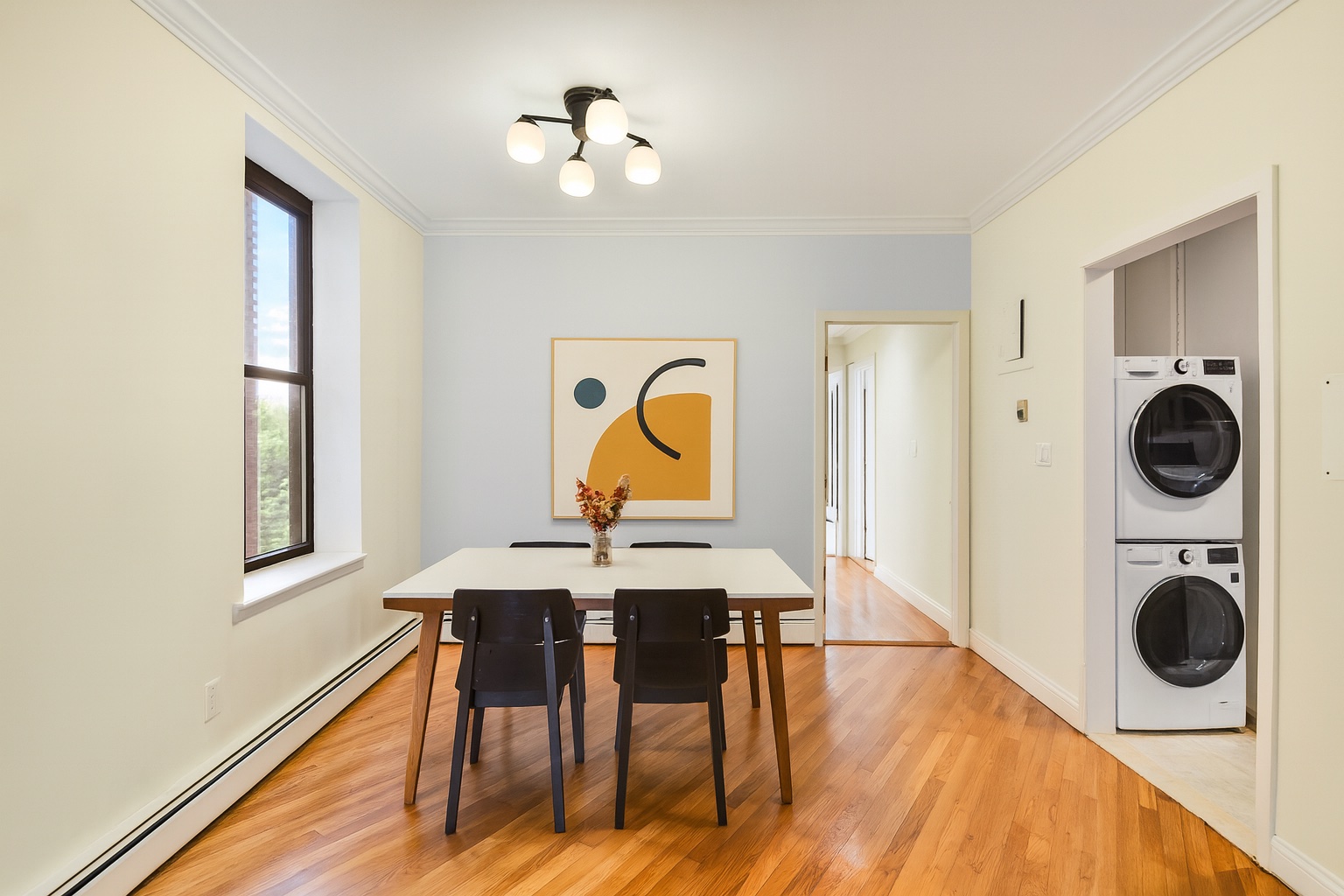120 2nd Avenue, Unit 5A Manhattan, NY 10003 - Photo 3 of 10 a view of dining room and wooden floor