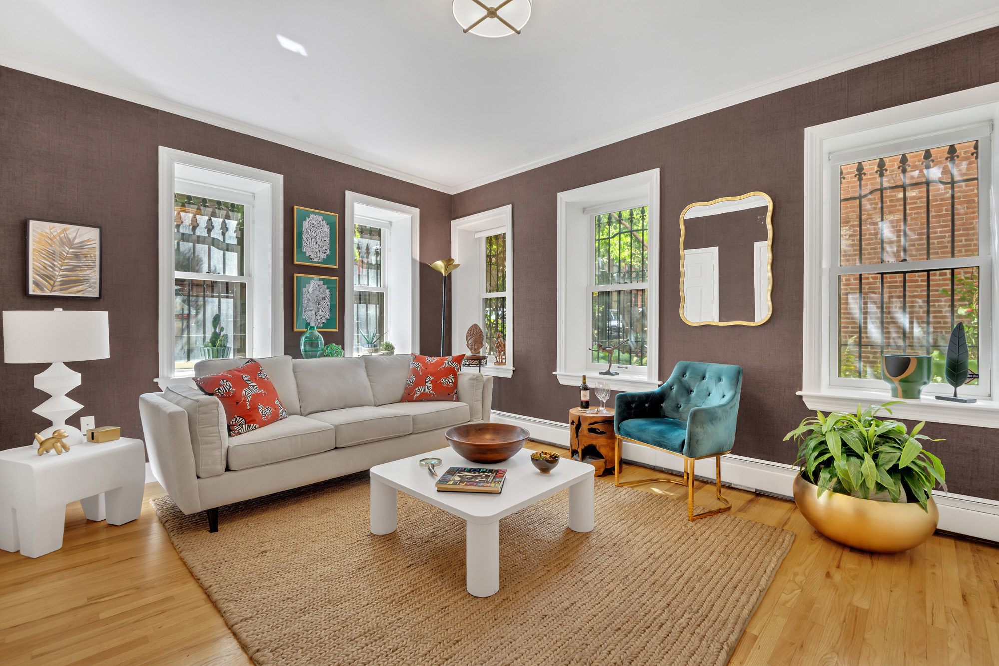 1 Mount Morris Park West, Unit 1A Manhattan, NY 10027 - Photo 4 of 12 a living room with furniture and floor to ceiling windows