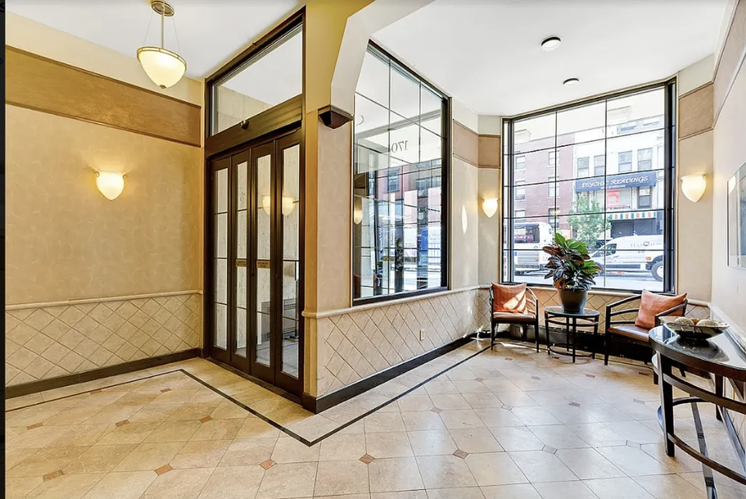 170 West 23rd Street, Unit 5X Manhattan, NY 10011 - Photo 7 of 9 a view of livingroom with furniture and a window