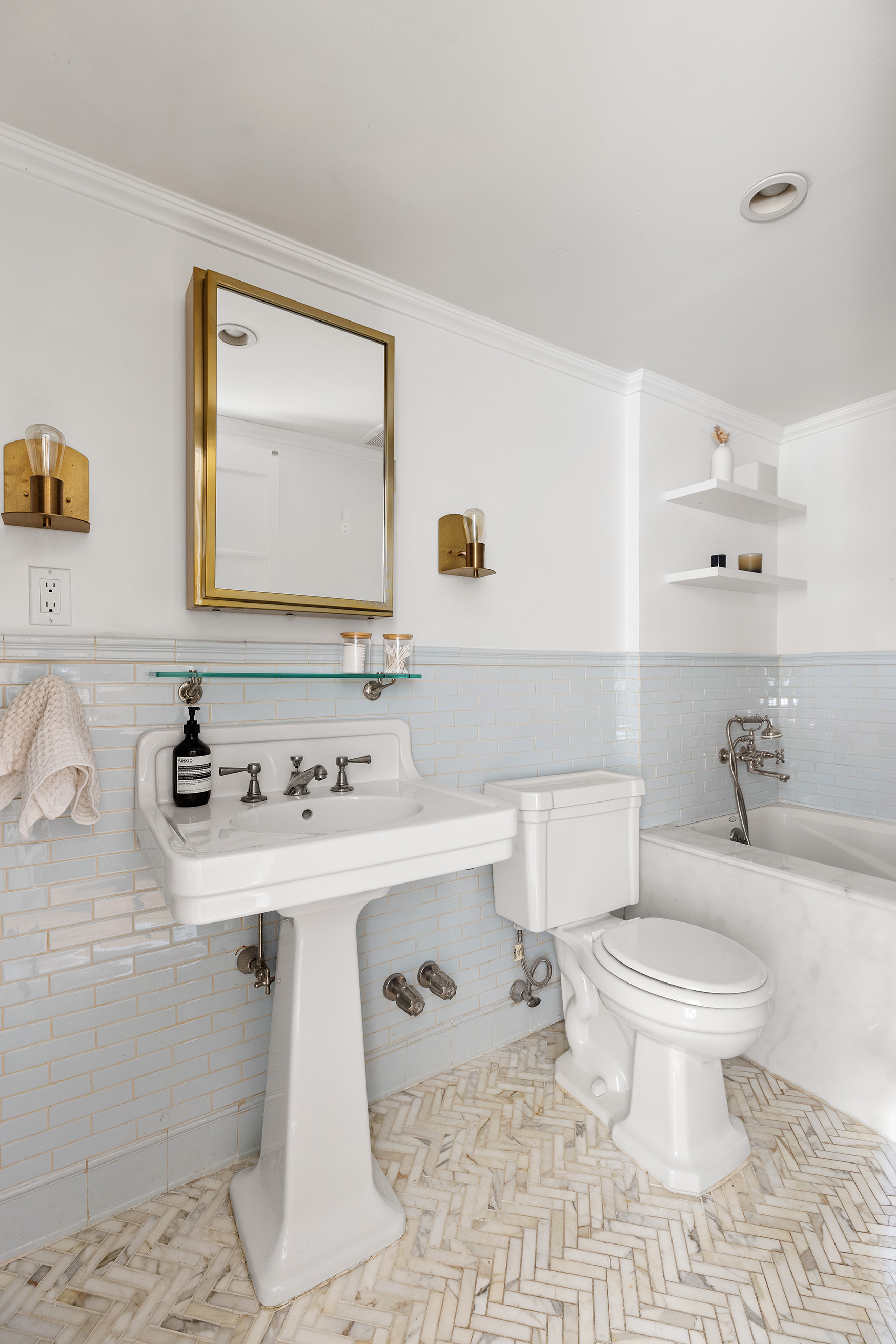 659 Degraw Street, Unit 1 Brooklyn, NY 11217 - Photo 6 of 10 a bathroom with a sink toilet and mirror