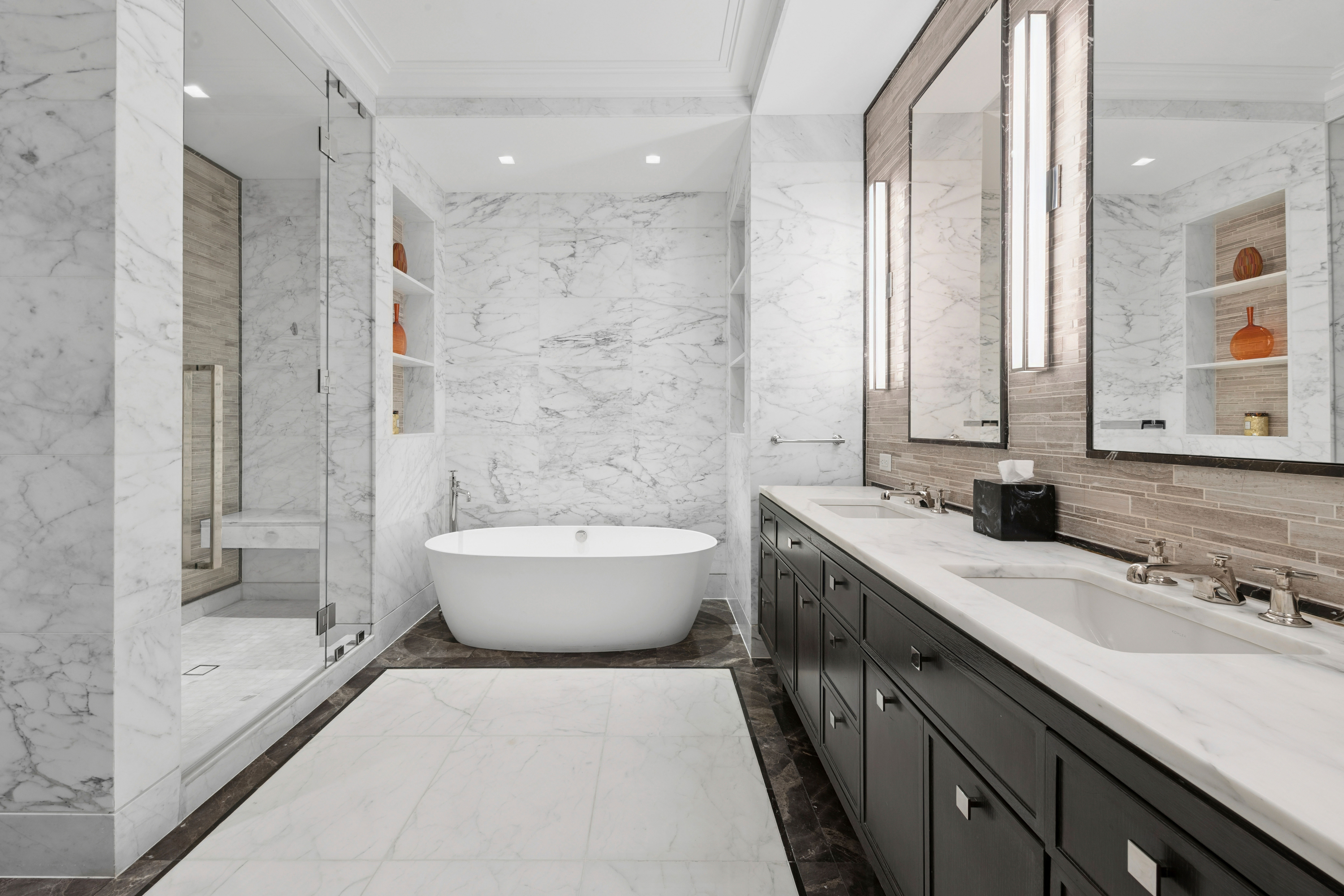 235 West 75th Street, Unit 507 Manhattan, NY 10023 - Photo 5 of 14 a spacious bathroom with a bathtub shower sink mirror and toilet