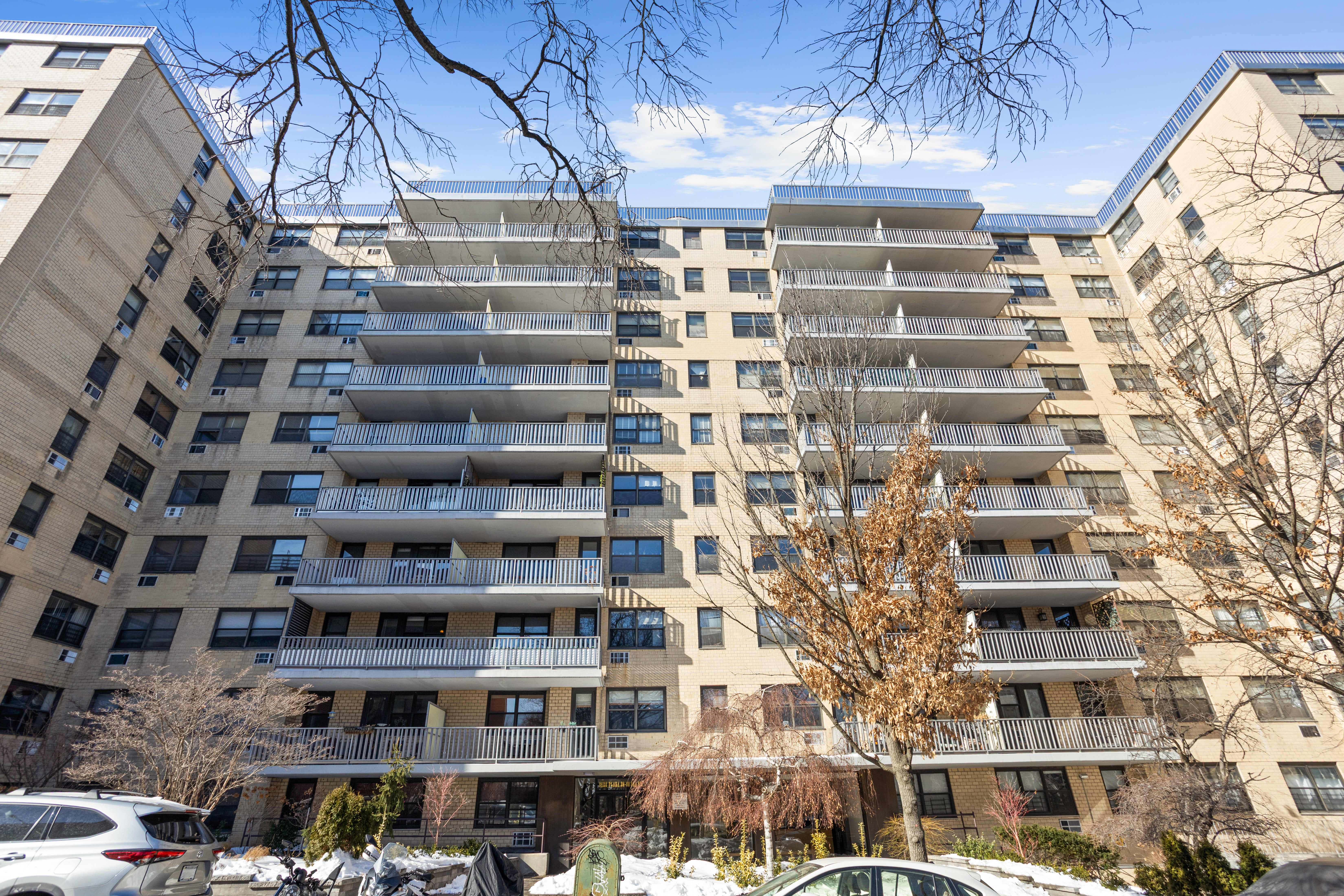 39-60 54th Street, Unit 4R Queens, NY 11377 - Photo 13 of 14 a view of a building with a lot of windows