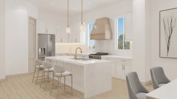 a kitchen with stainless steel appliances granite countertop a sink a stove a refrigerator and island with wooden floor