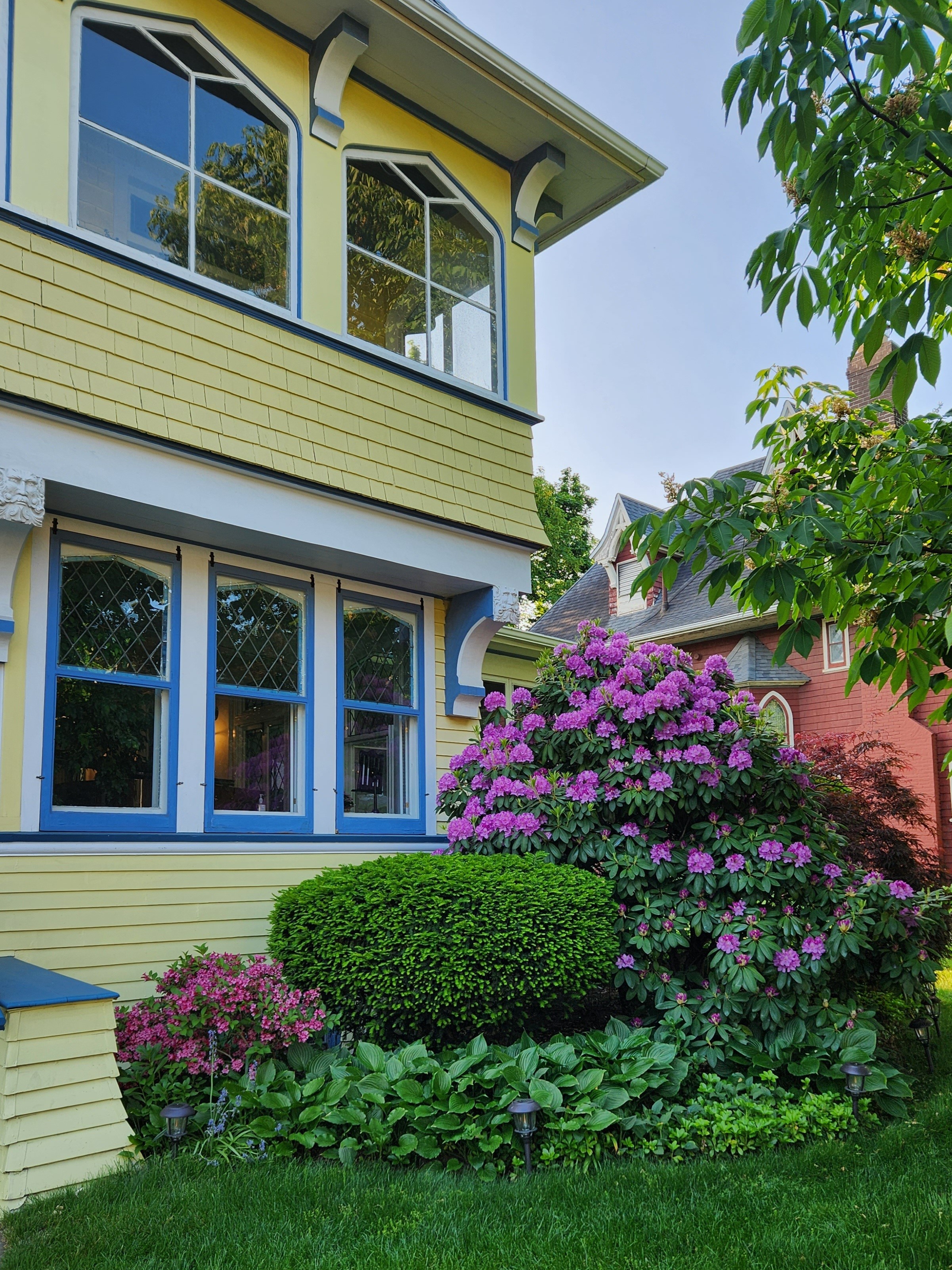 215 Marlborough Road Brooklyn, NY 11226 - Photo 18 of 21 a front view of a house with a yard and fountain