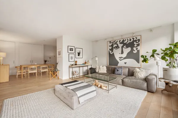 a living room with furniture and a table