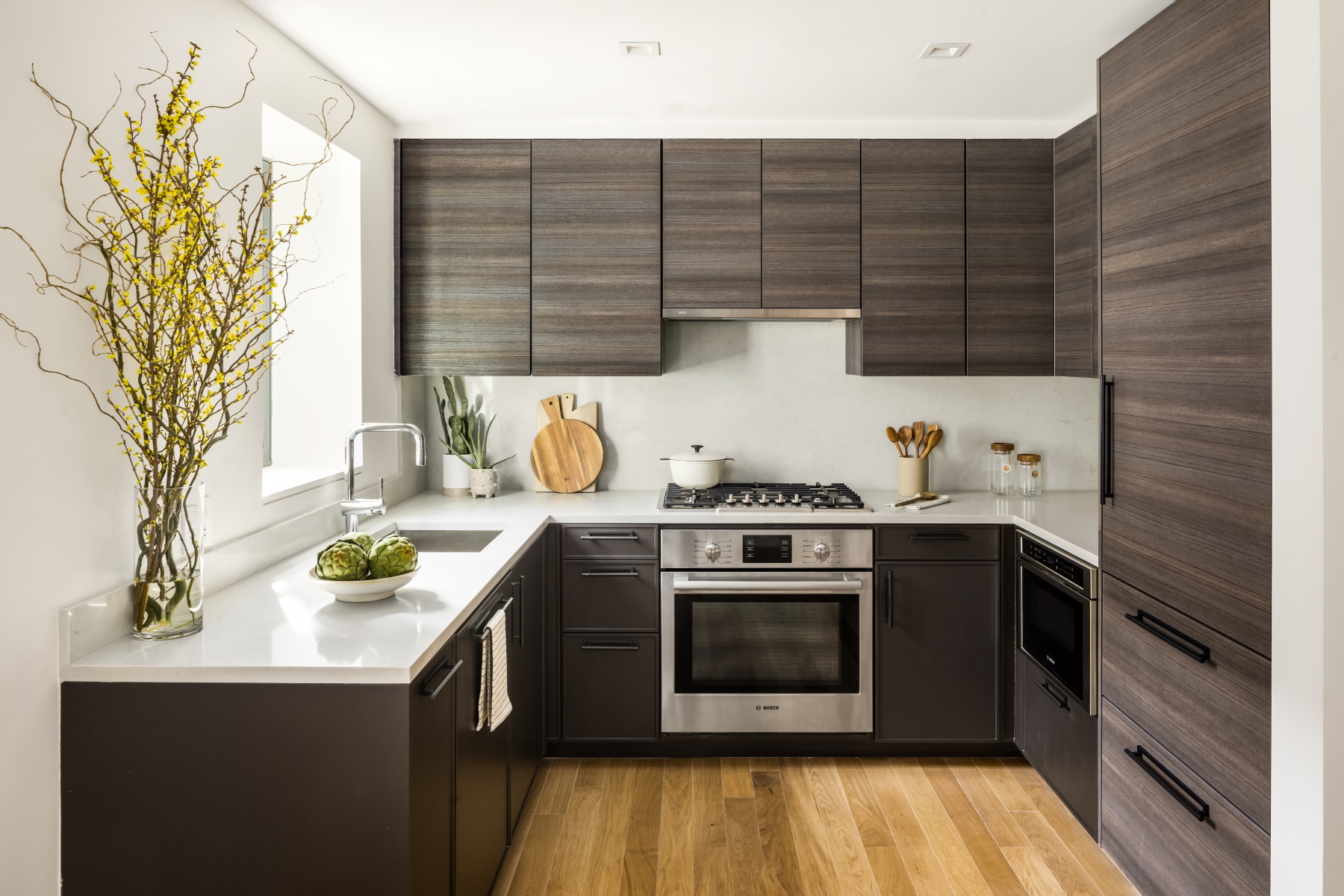 245 East 78th Street, Unit 5A Manhattan, NY 10075 - Photo 3 of 14 a kitchen with a stove and a sink