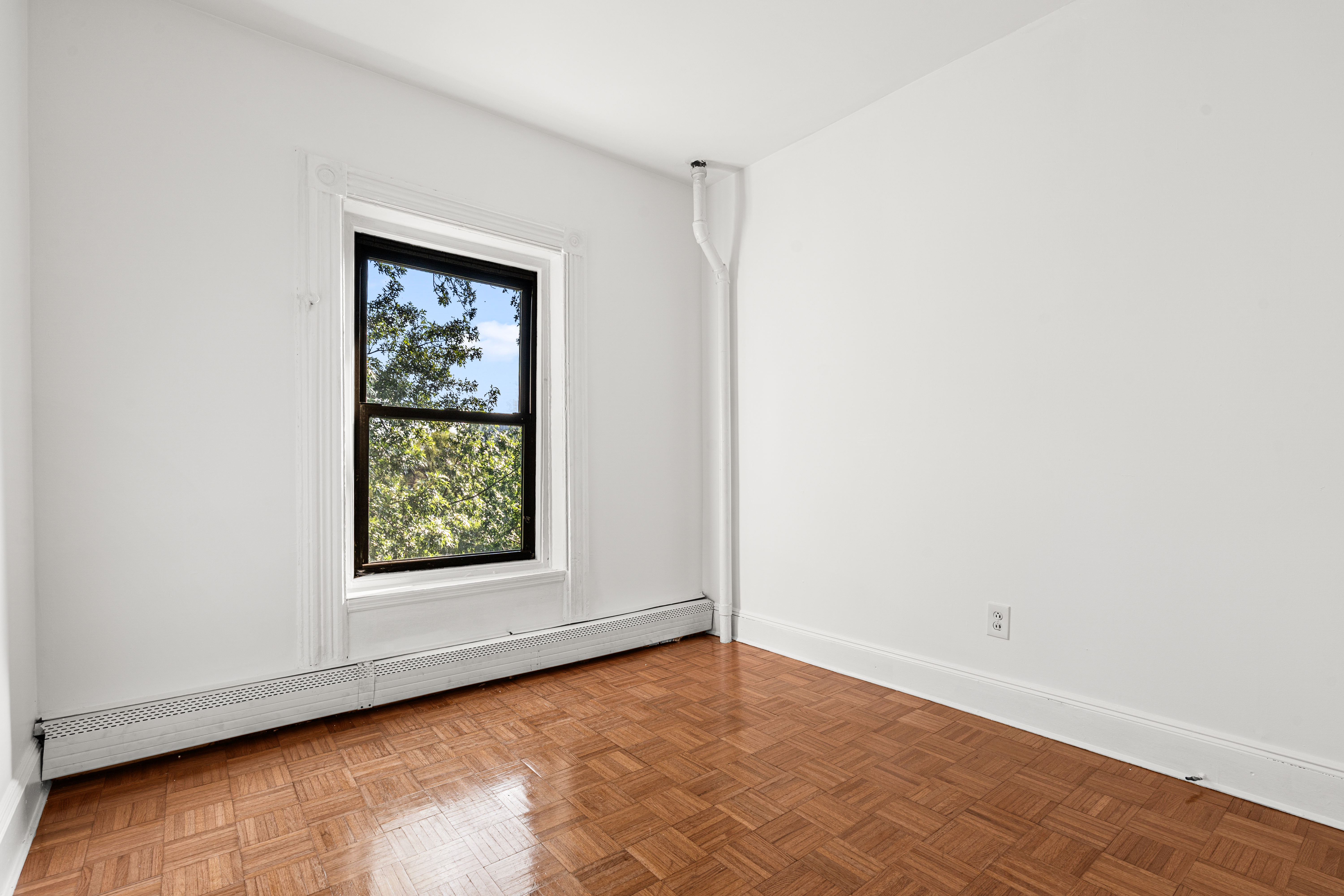 306 Lafayette Avenue, Unit 4 Brooklyn, NY 11238 - Photo 8 of 11 an empty room with a window