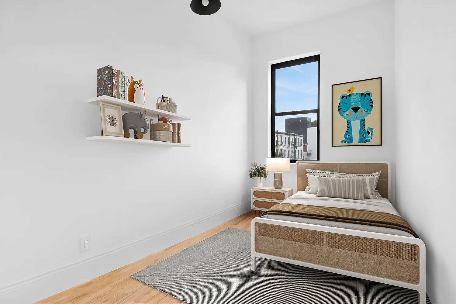 a bedroom with a bed and painting on the wall