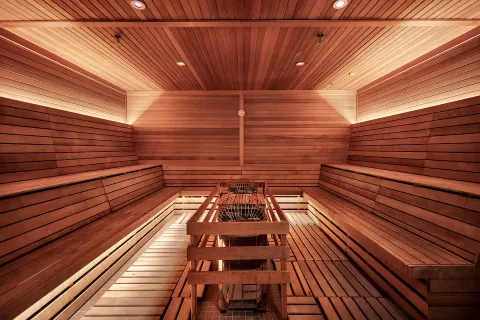 a bedroom with a bed and a fireplace