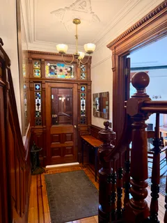a view of a house with large windows