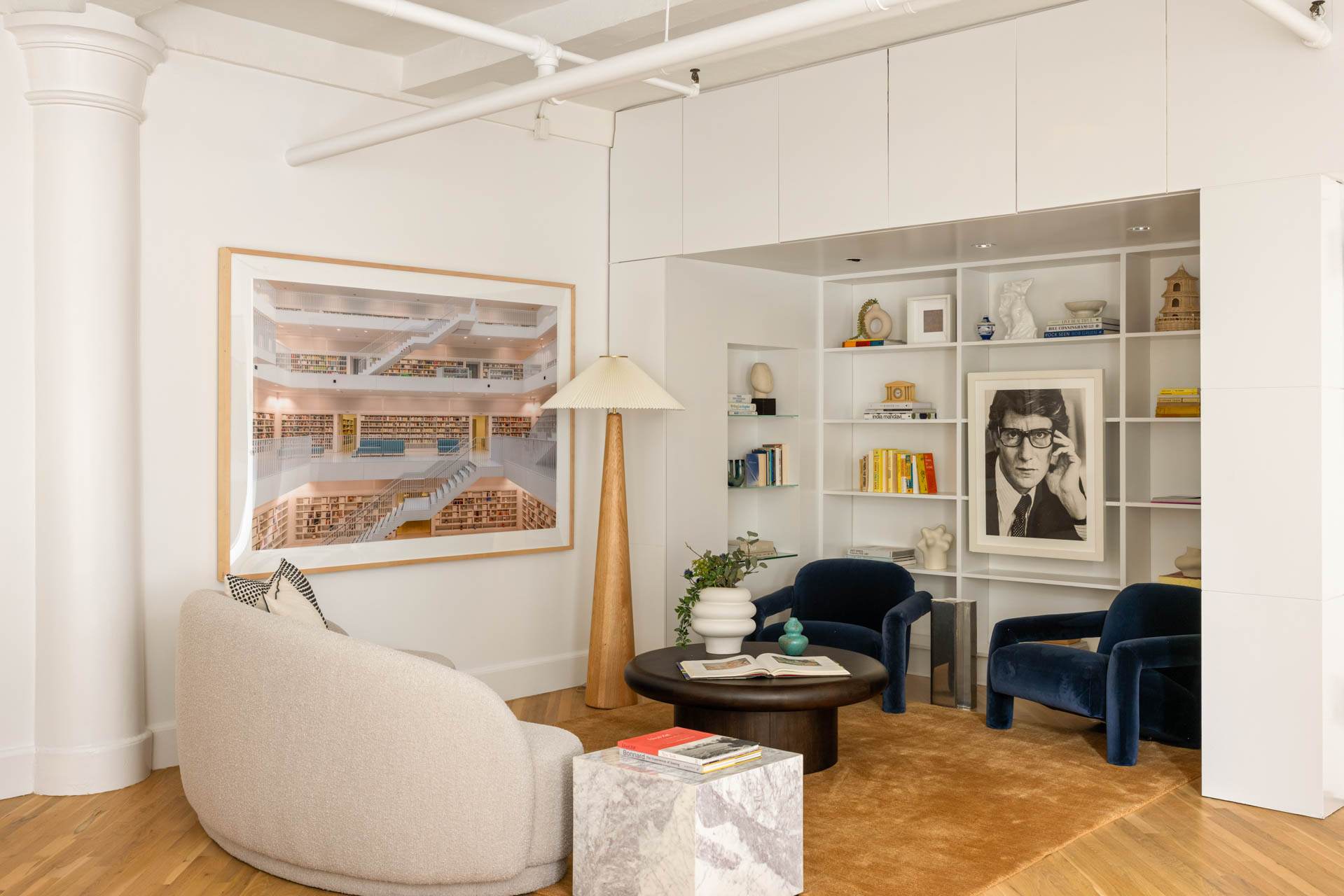 130 West 17th Street, Unit 5S Manhattan, NY 10011 - Photo 2 of 17 a living room with furniture and a chandelier