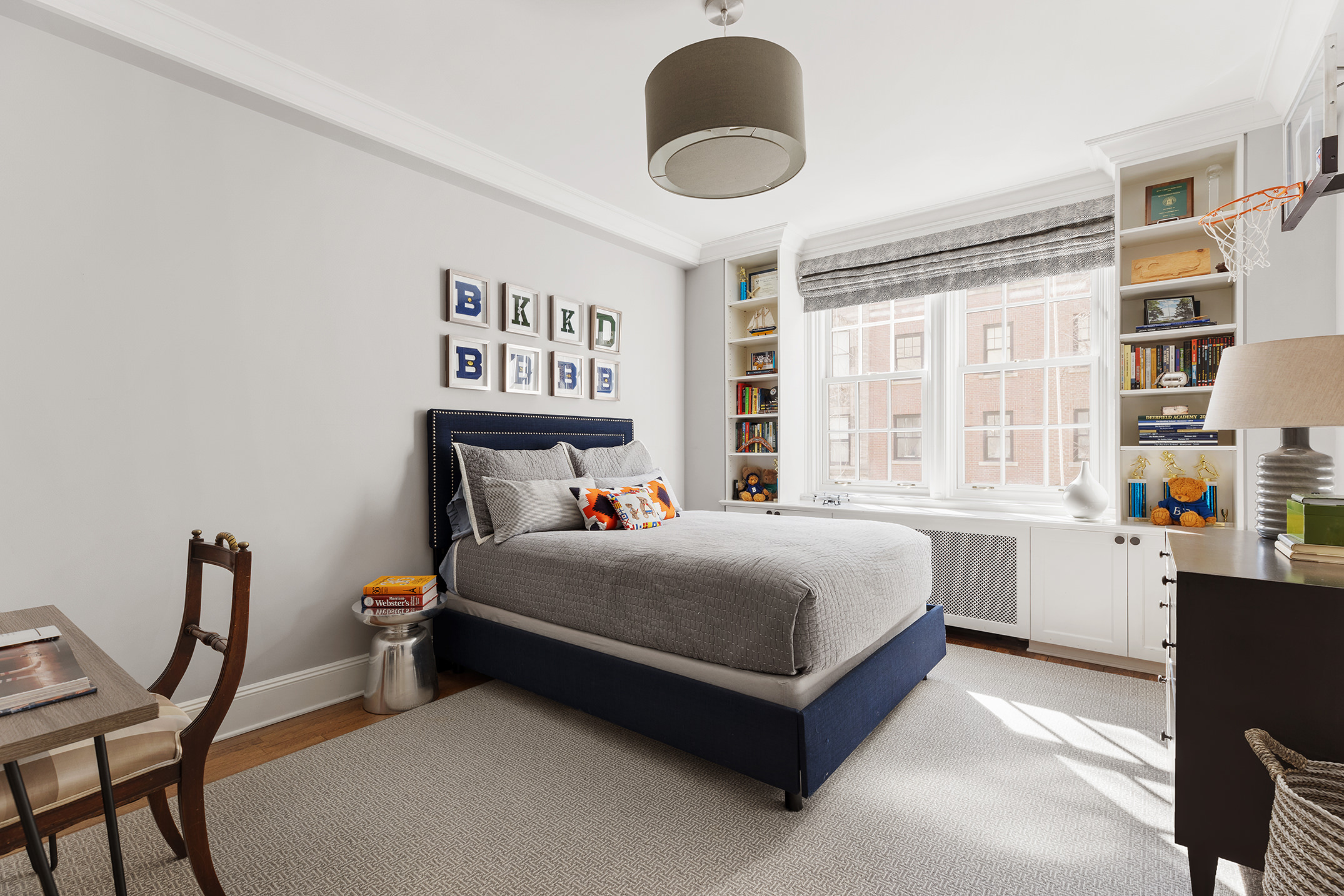 133 East 80th Street, Unit 3A Manhattan, NY 10075 - Photo 11 of 19 a bedroom with a bed and chair