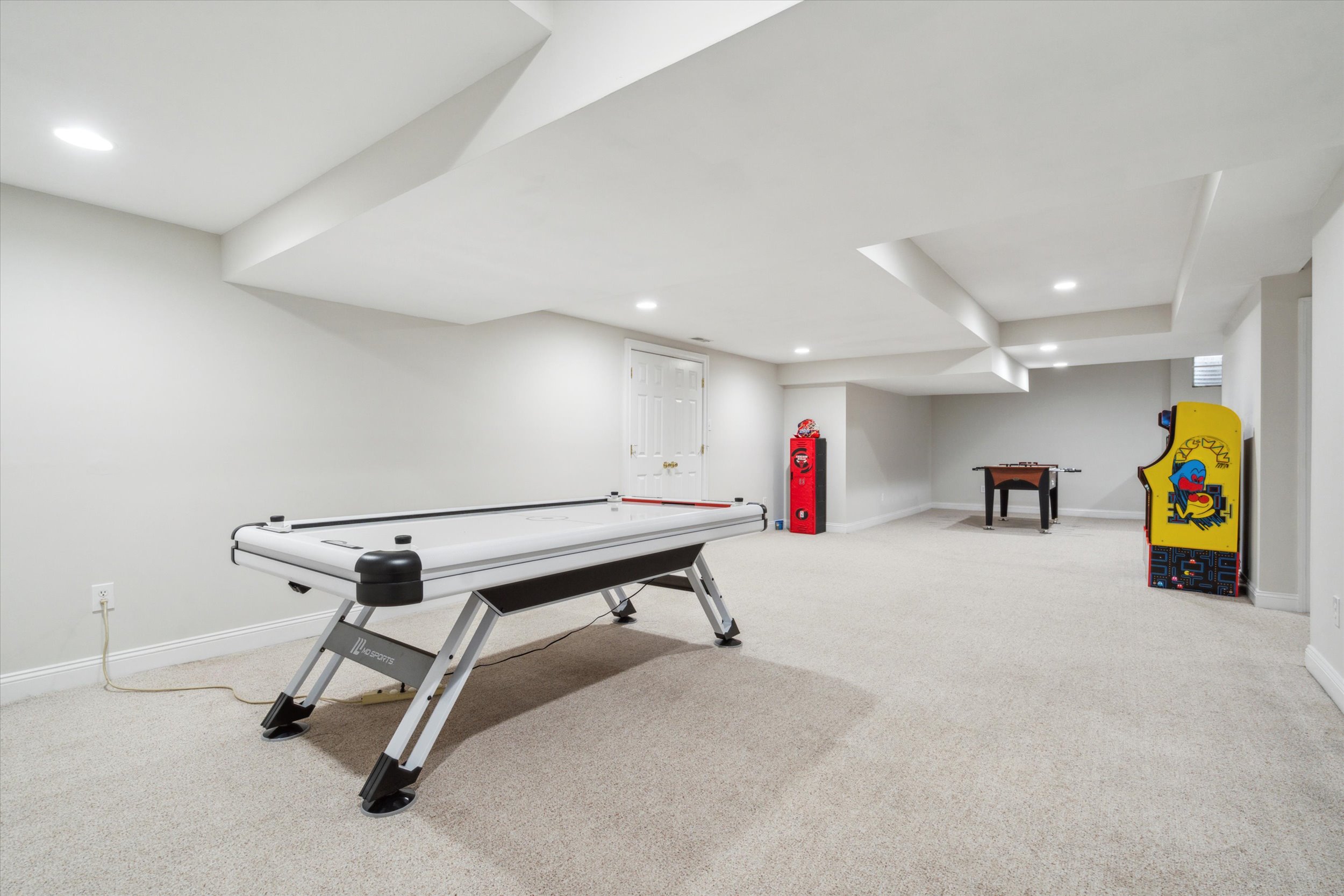 145 Biddulph Road Wayne, PA 19087 - Photo 33 of 39 a view of game room with window and couch