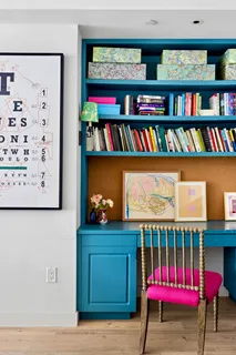 a view of an empty room with furniture wooden floor and window