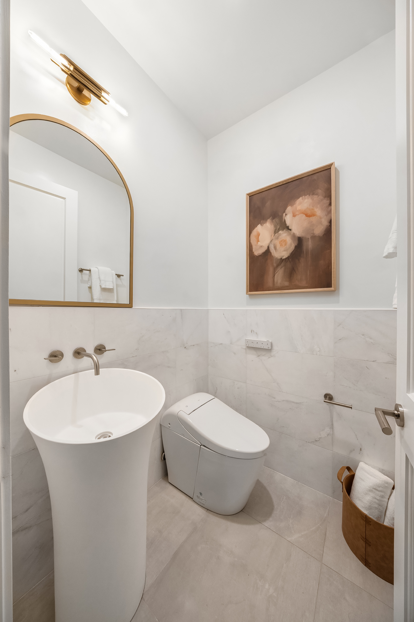 53 West 85th Street Manhattan, NY 10024 - Photo 33 of 37 a bathroom with a sink and a mirror