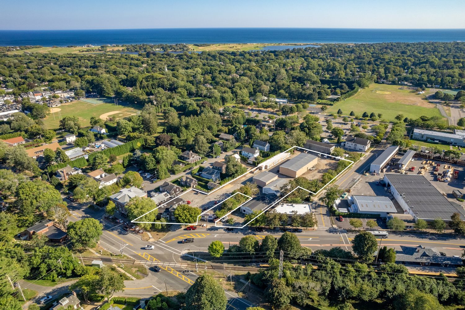 an aerial view of houses with outdoor space