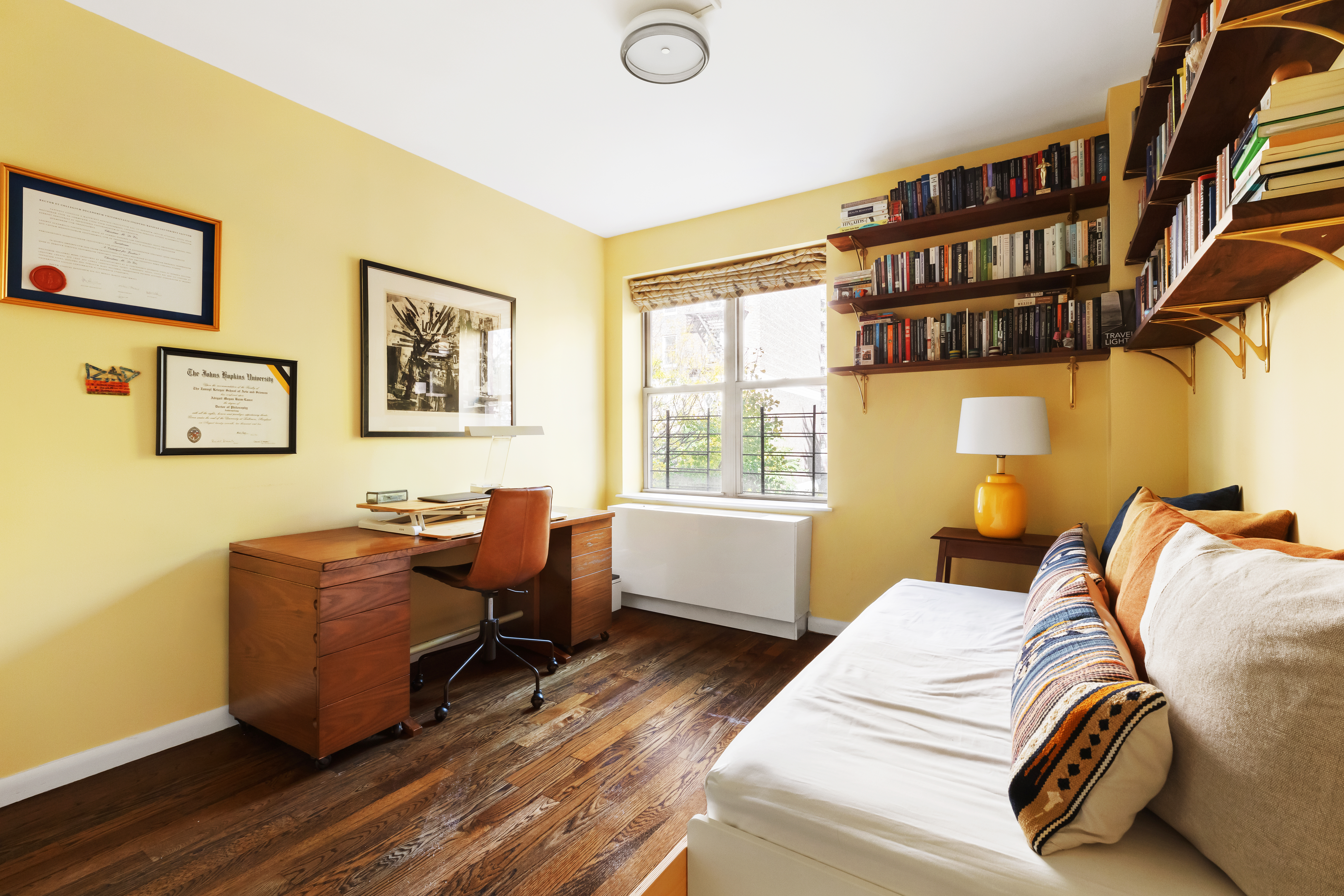 736 West 187th Street, Unit 303 Manhattan, NY 10033 - Photo 10 of 16 a bedroom with a bed and a window