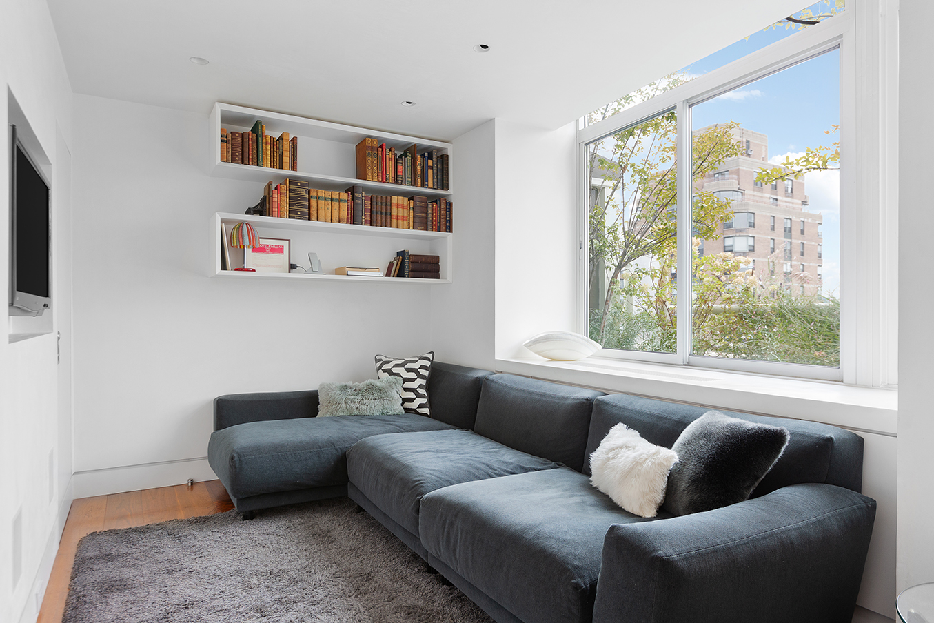 2373 Broadway, Unit PH1 Manhattan, NY 10024 - Photo 11 of 28 a living room with furniture and a window