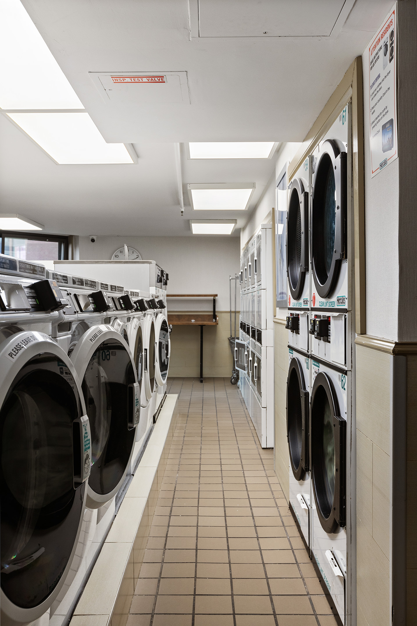 1619 3rd Avenue, Unit 21H Manhattan, NY 10128 - Photo 12 of 16 a view of a washer and dryer in a utility room