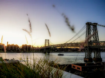 a view of a patio with a table and chairs and potted plants
